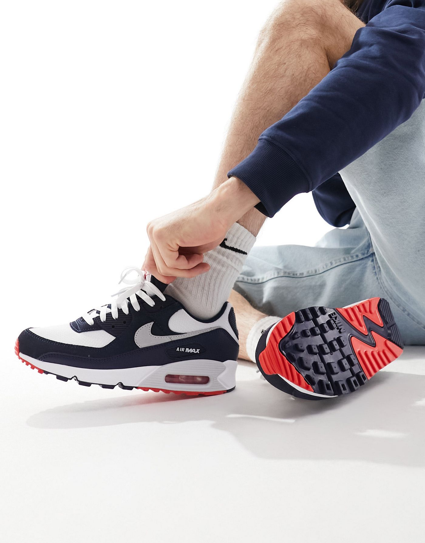 Nike Air Max 90 trainers in navy, white and red