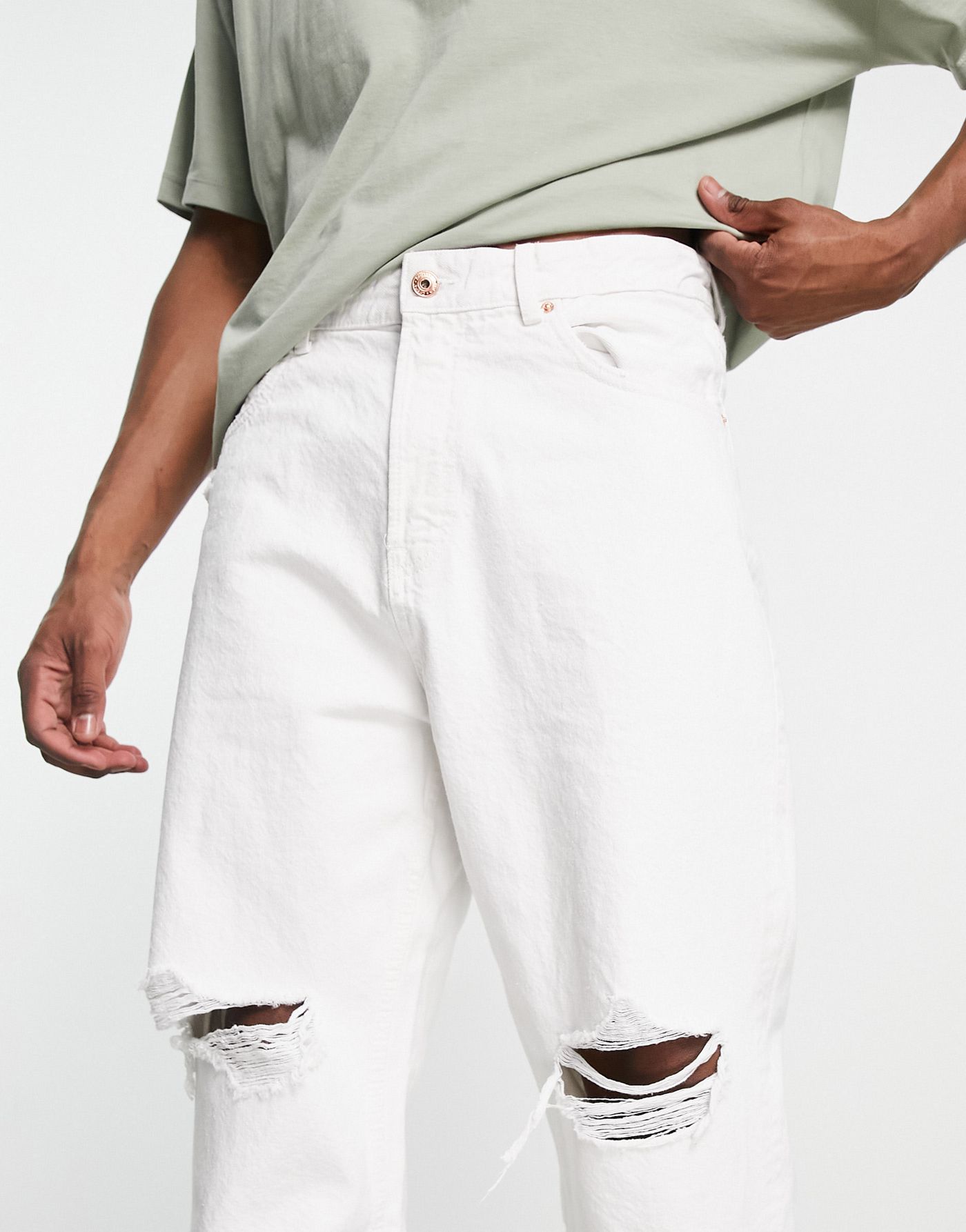 Bershka tapered jeans with rips in white