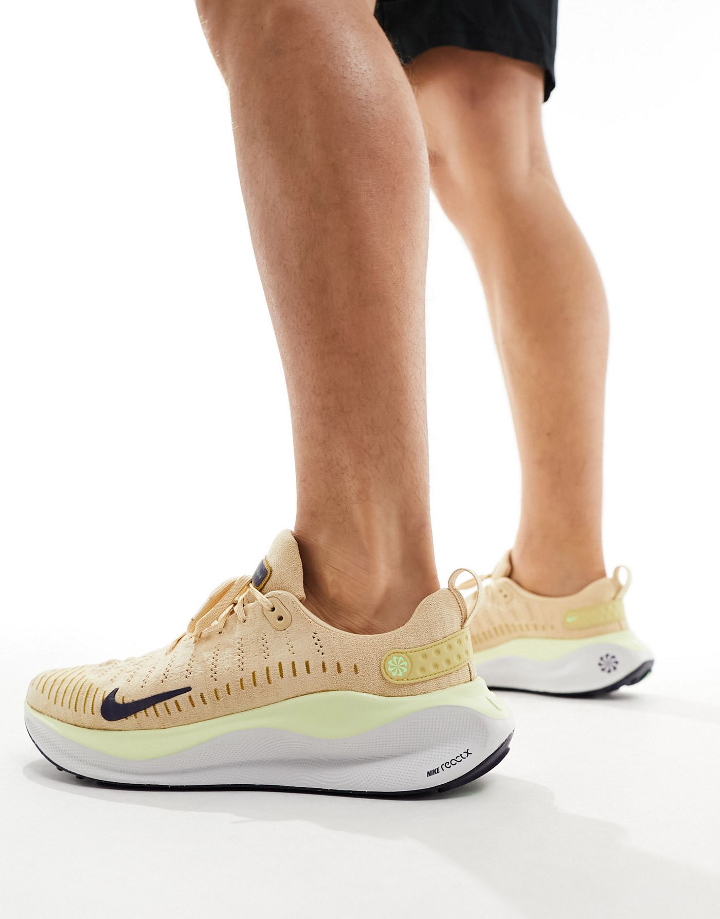 Nike Reactx Infinity Run 4 trainer in beige