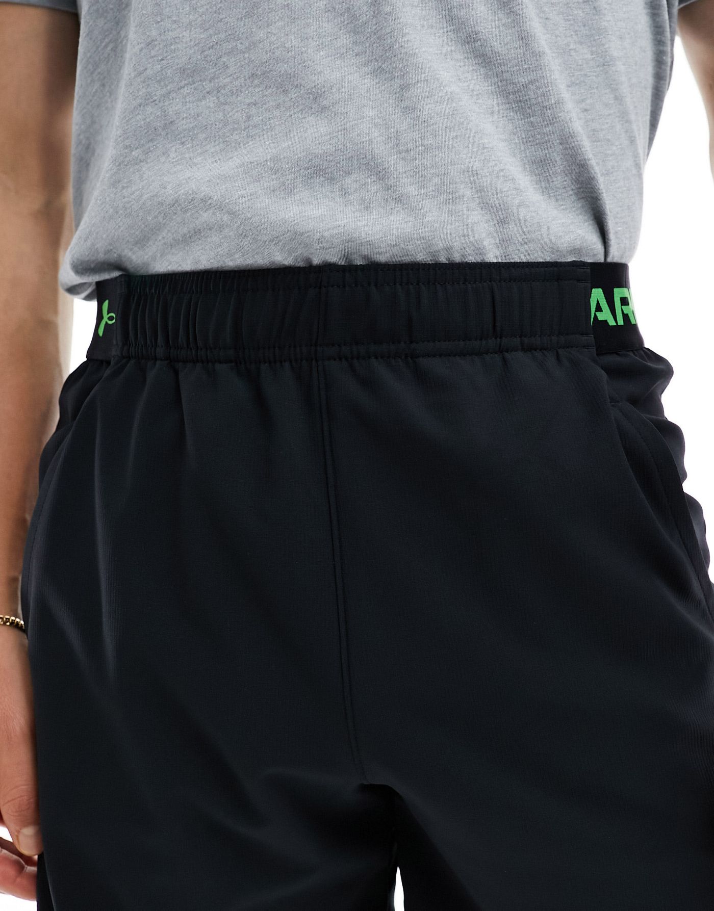 Under Armour Vanish woven 6 inch shorts in black and green