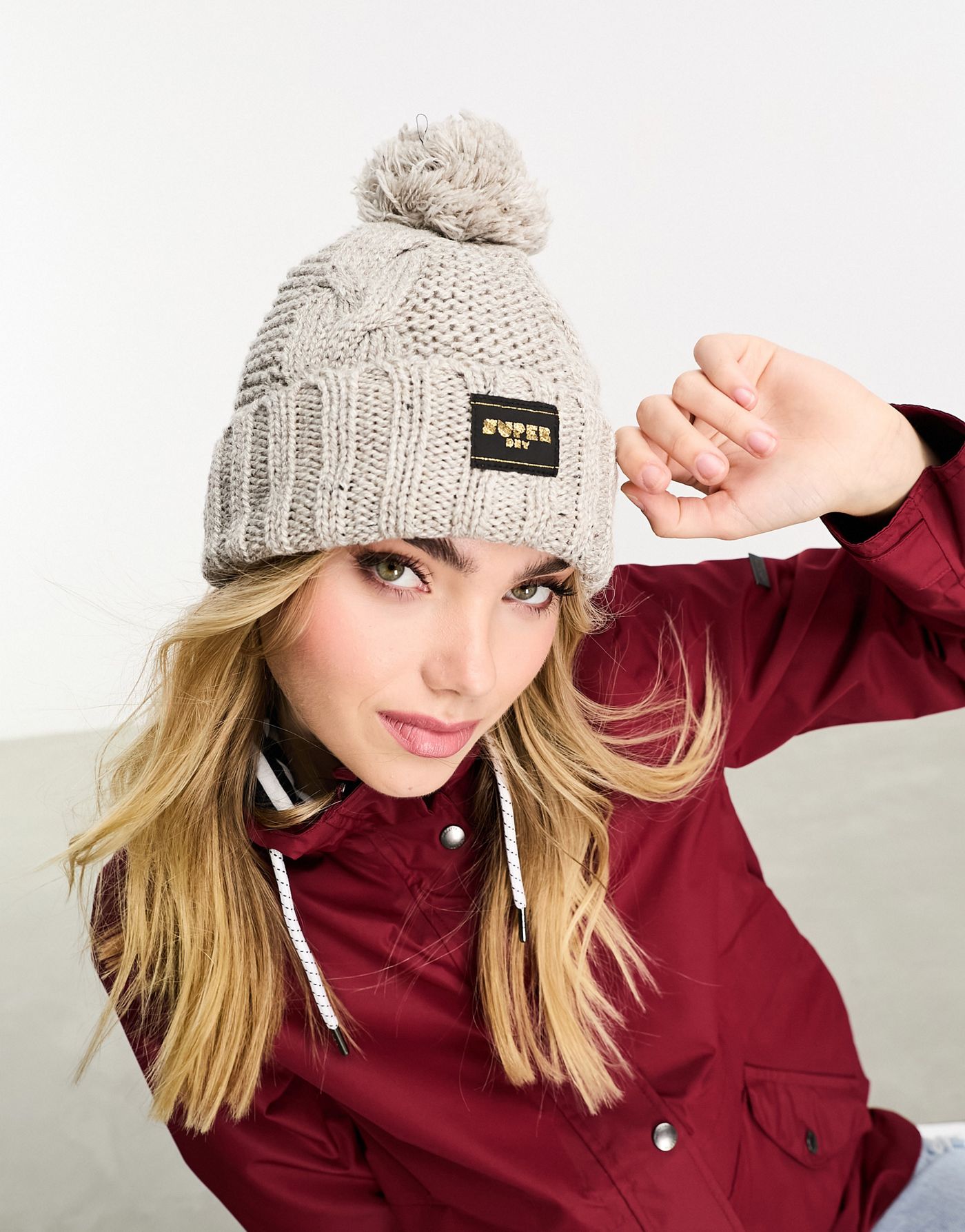 Superdry cable knit beanie hat in Oaty Beige Fleck