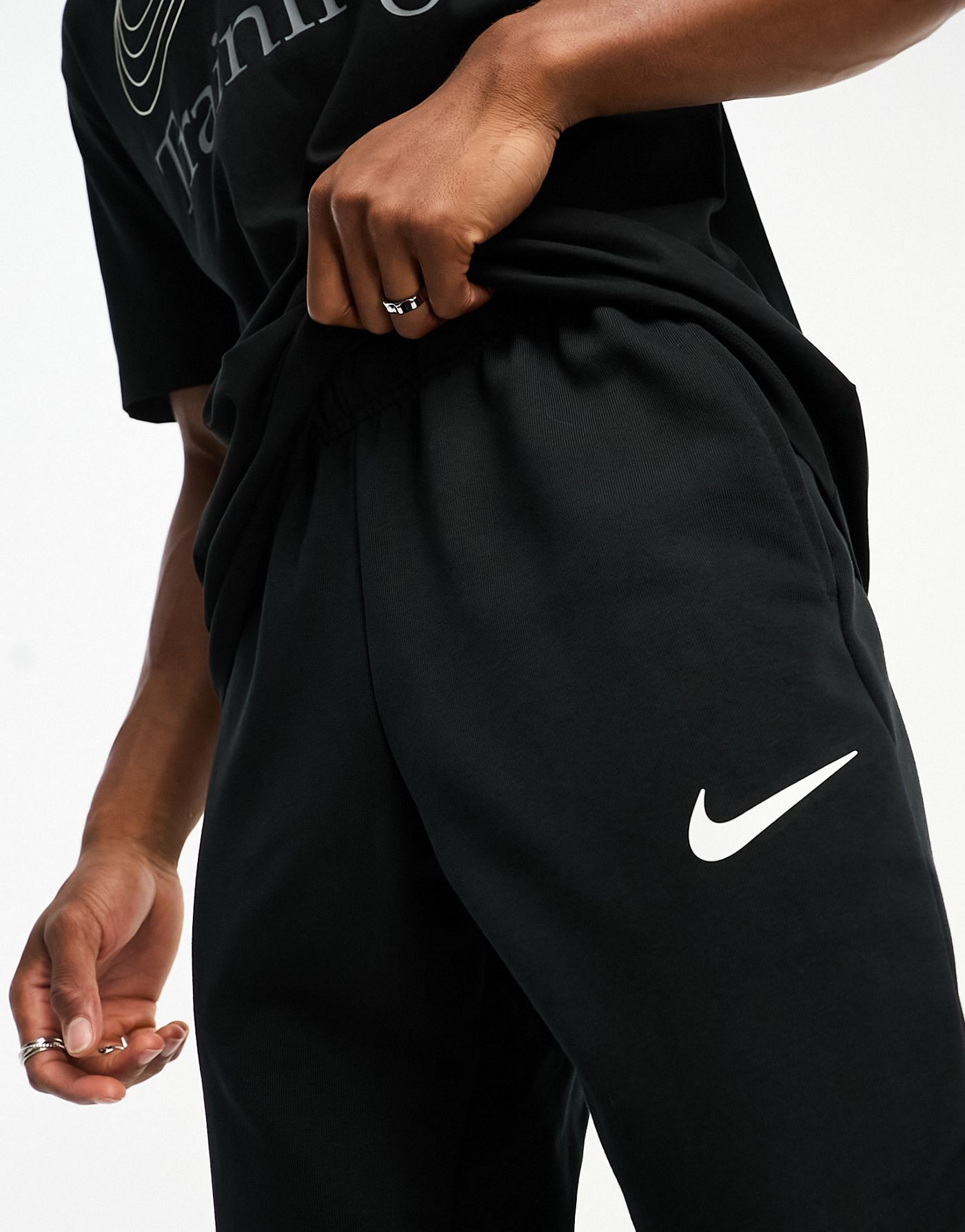 Nike Training Dri-FIT Energy Swoosh taper joggers in black