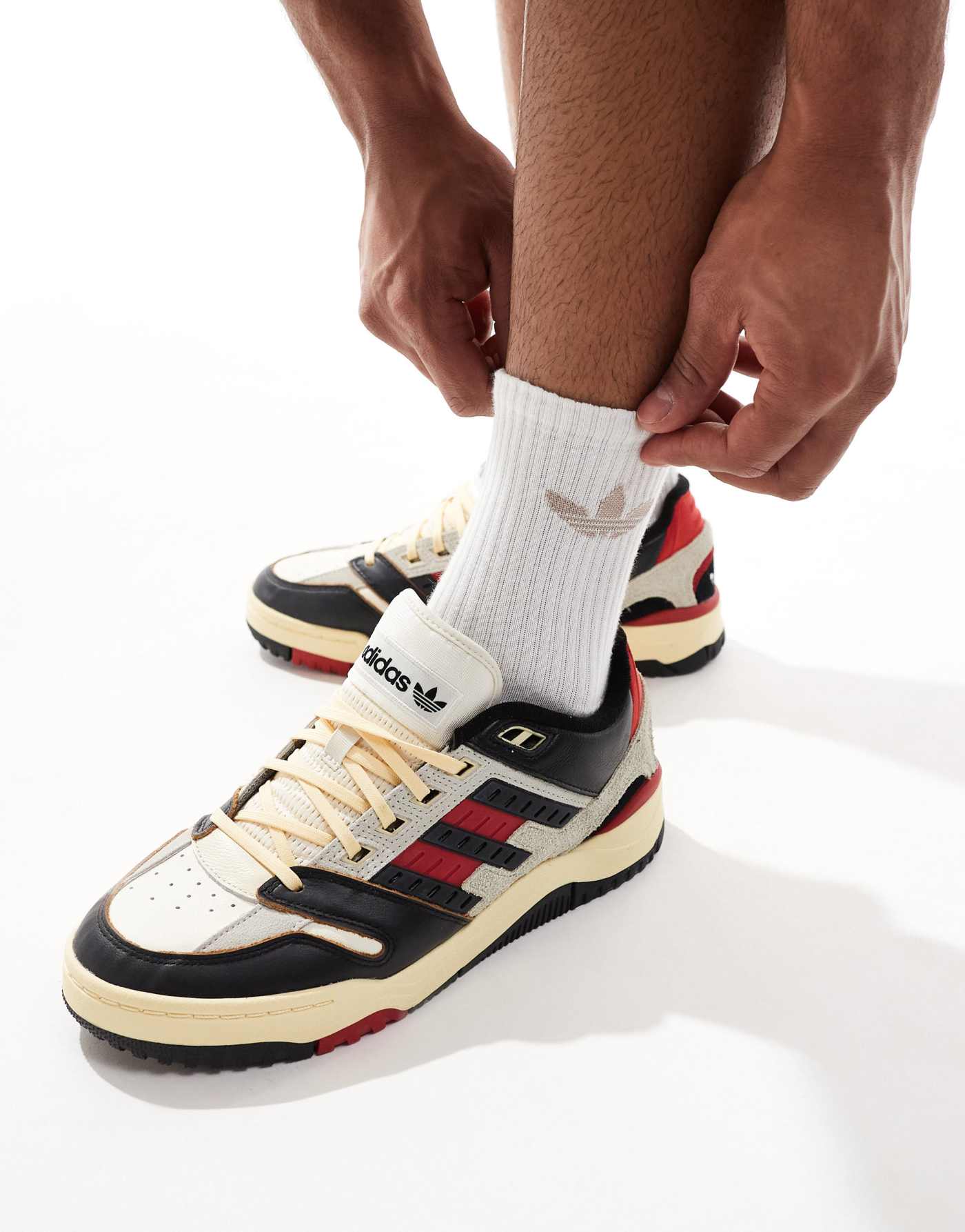 adidas Performance Torsion Phantom Low trainers in off white, black & red