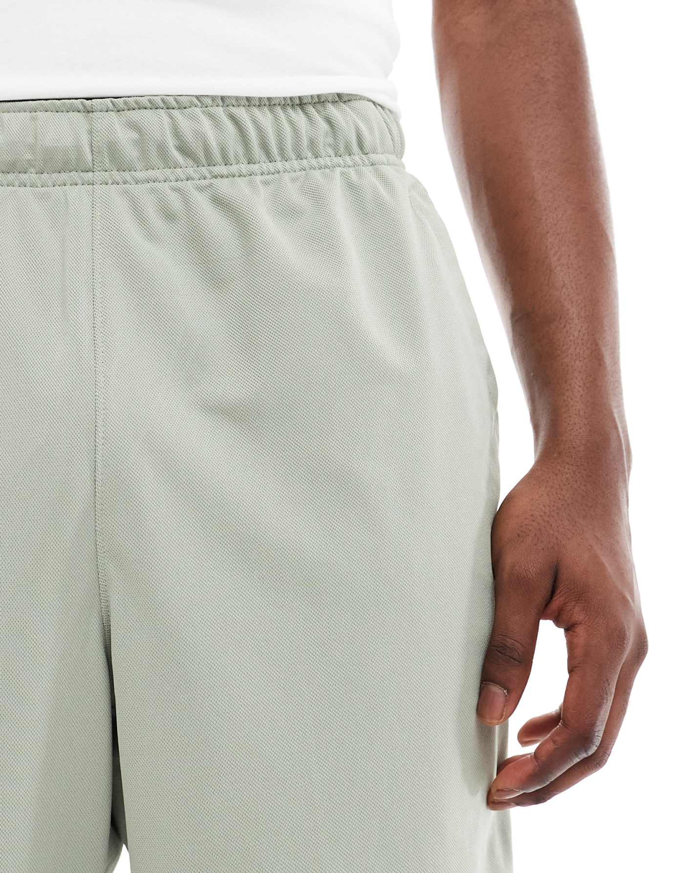 Nike Training Dri-Fit Totality knit 7 inch shorts in light green