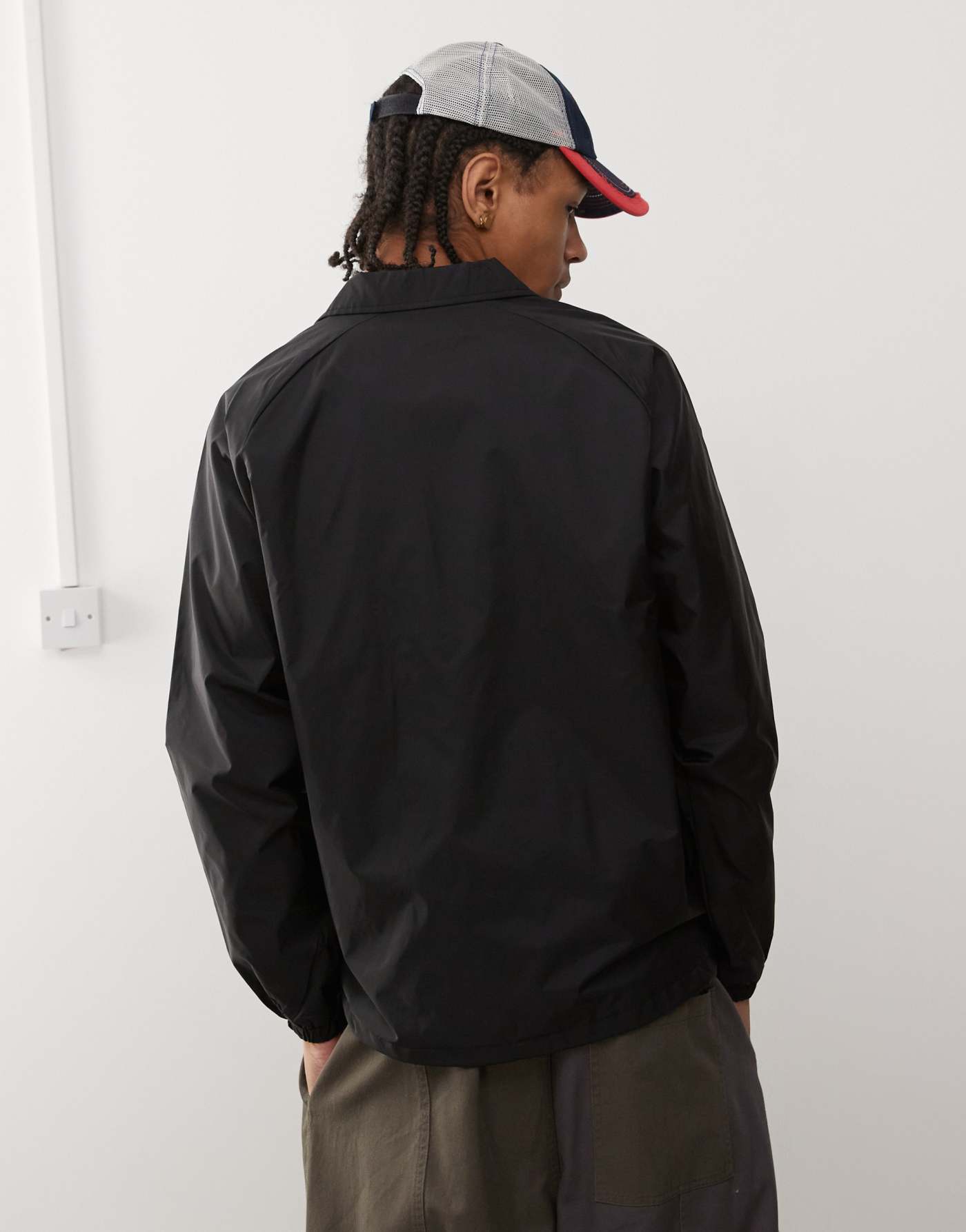 Vans torrey coach jacket with left chest logo in black