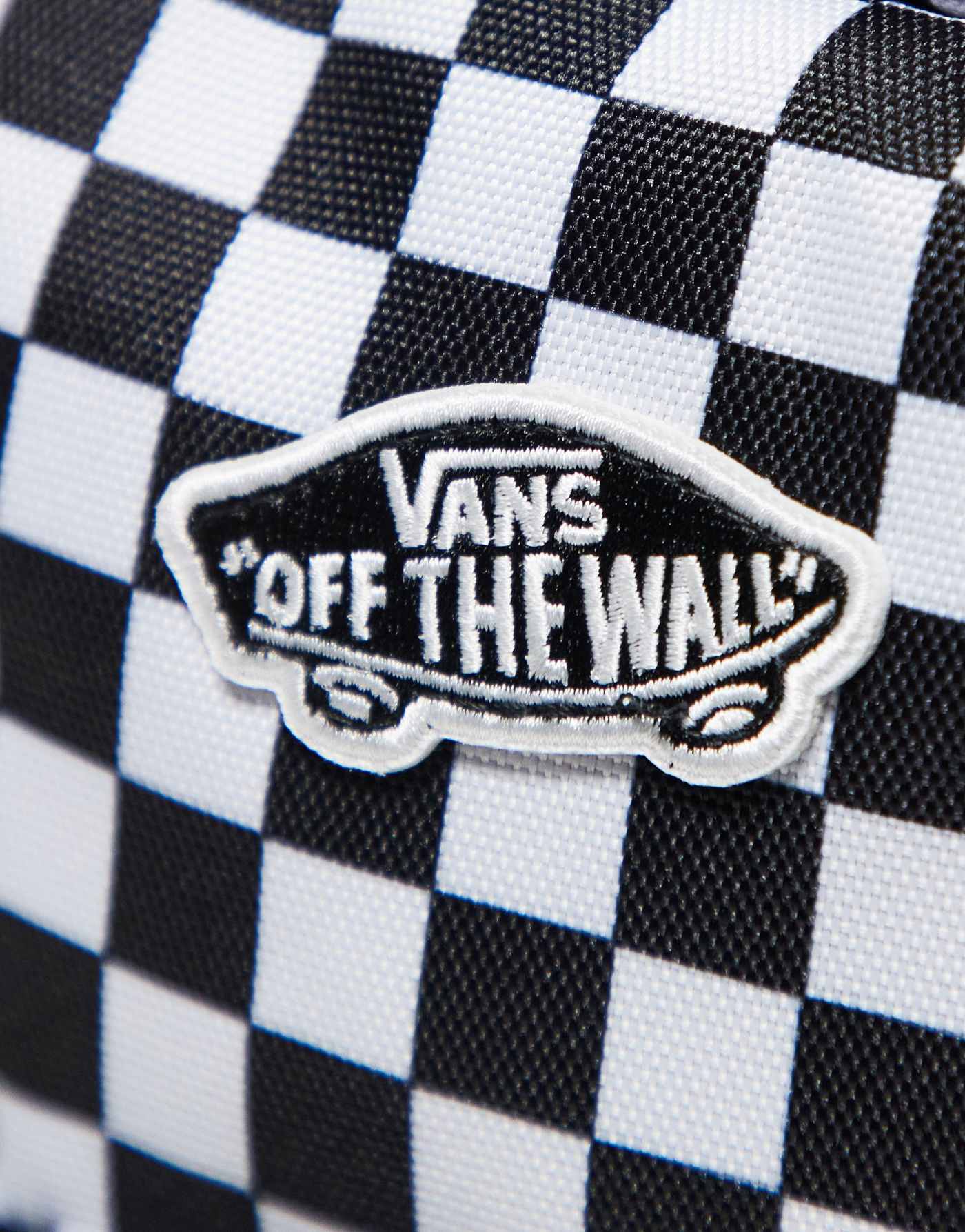 Vans got this mini backpack in black and white