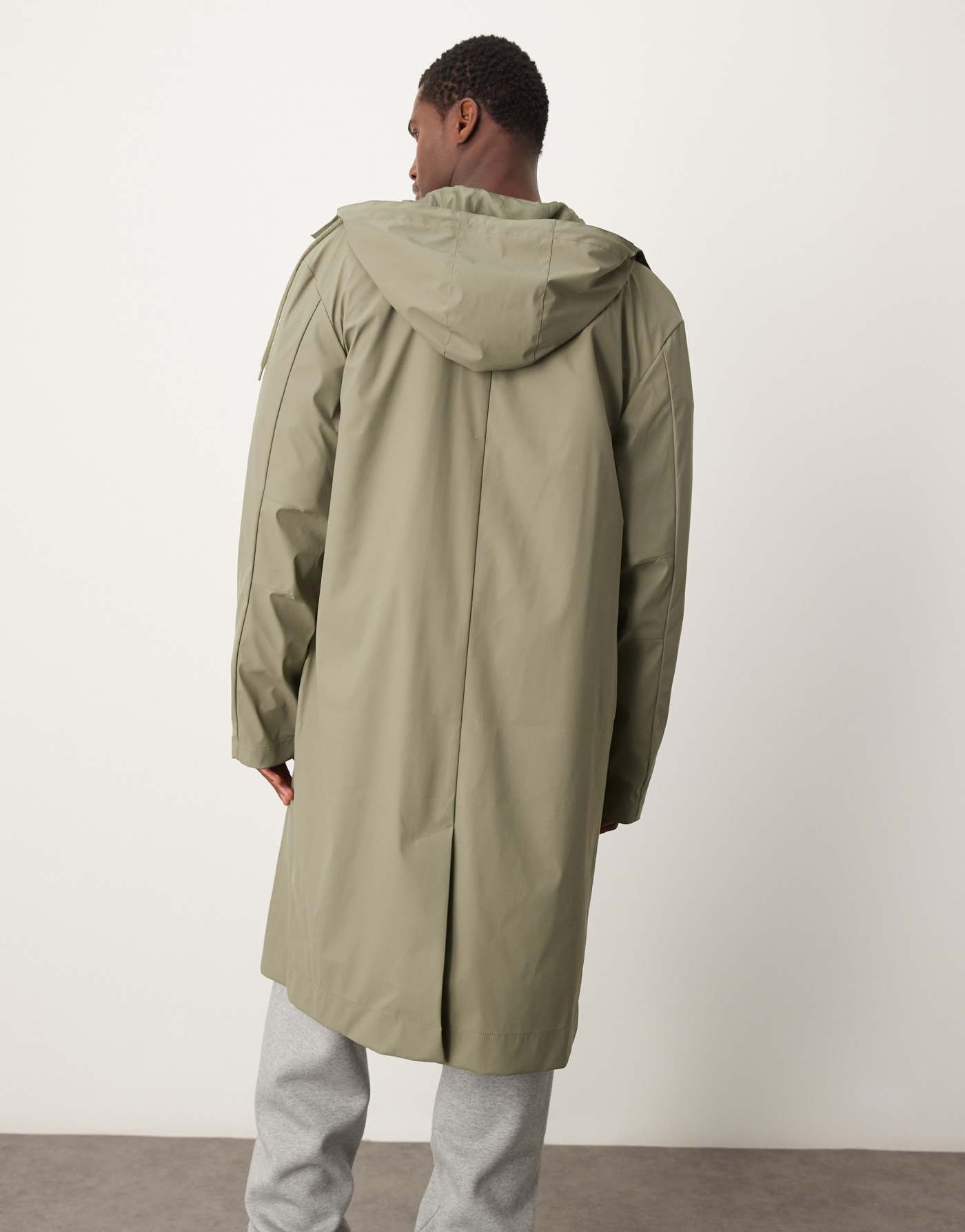 ASOS DESIGN rubberised trench coat with hood in khaki