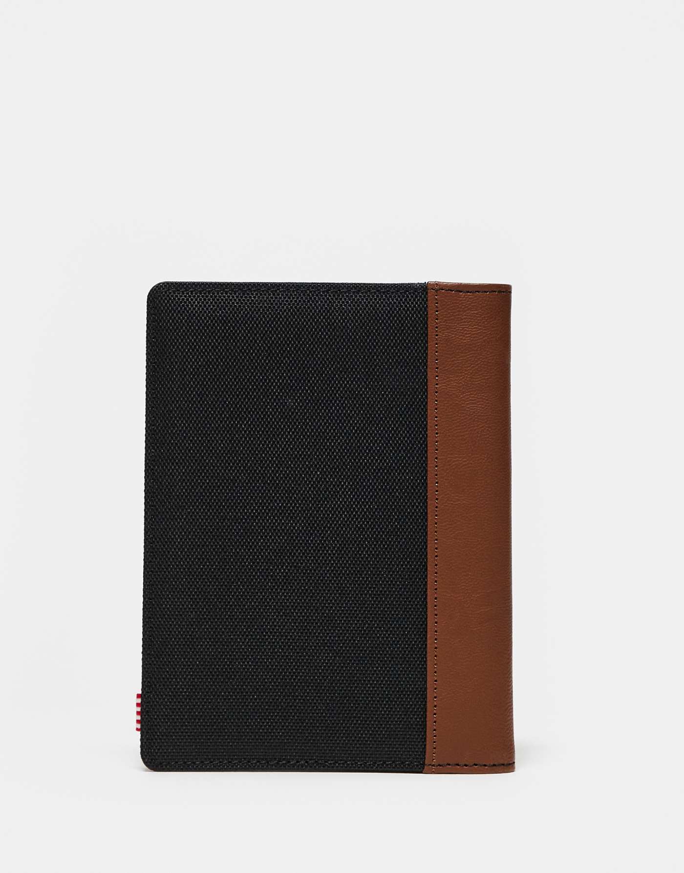 Herschel Supply Co raynor passport holder in black/tan