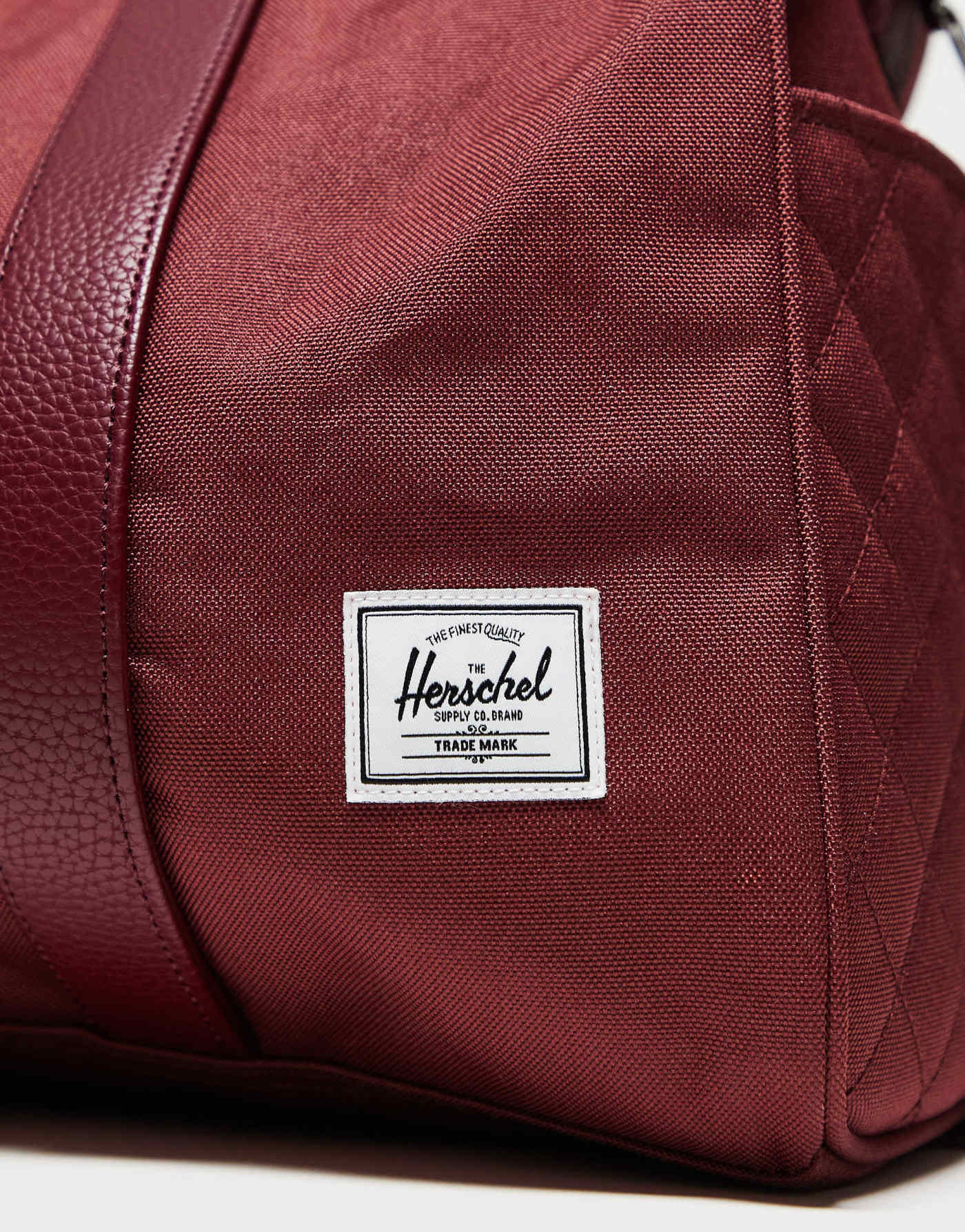 Herschel Supply Co quilted novel duffel bag in burgundy