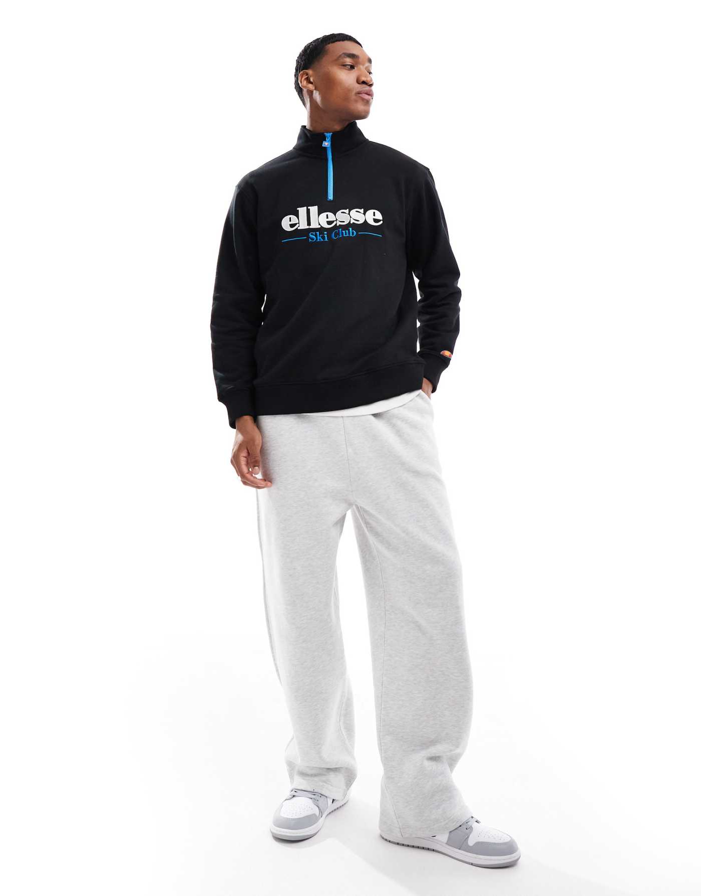 ellesse Baleor quarter zip sweat in black