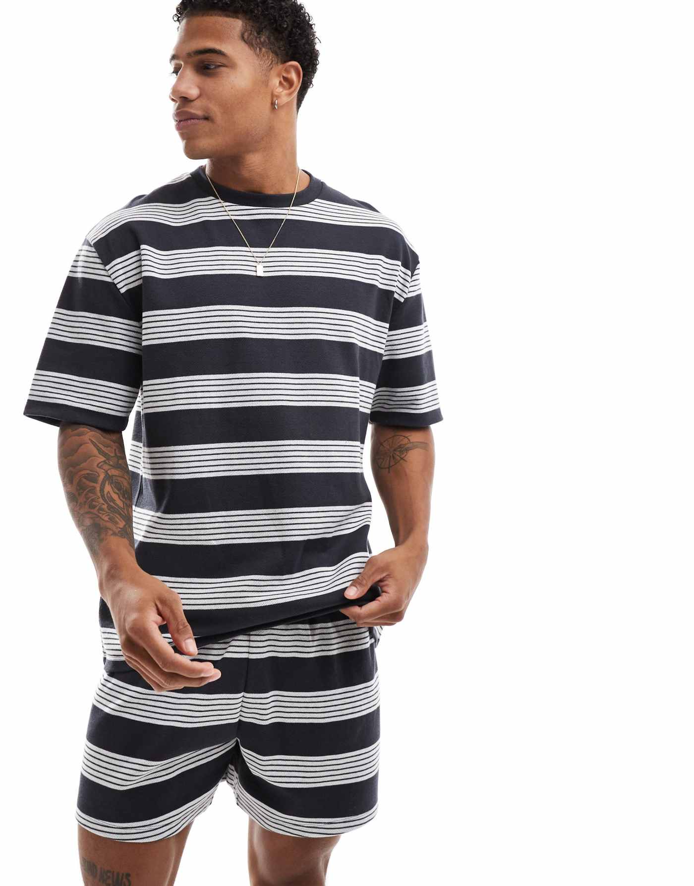 ASOS DESIGN pyjama set with t-shirt and shorts in black stripe