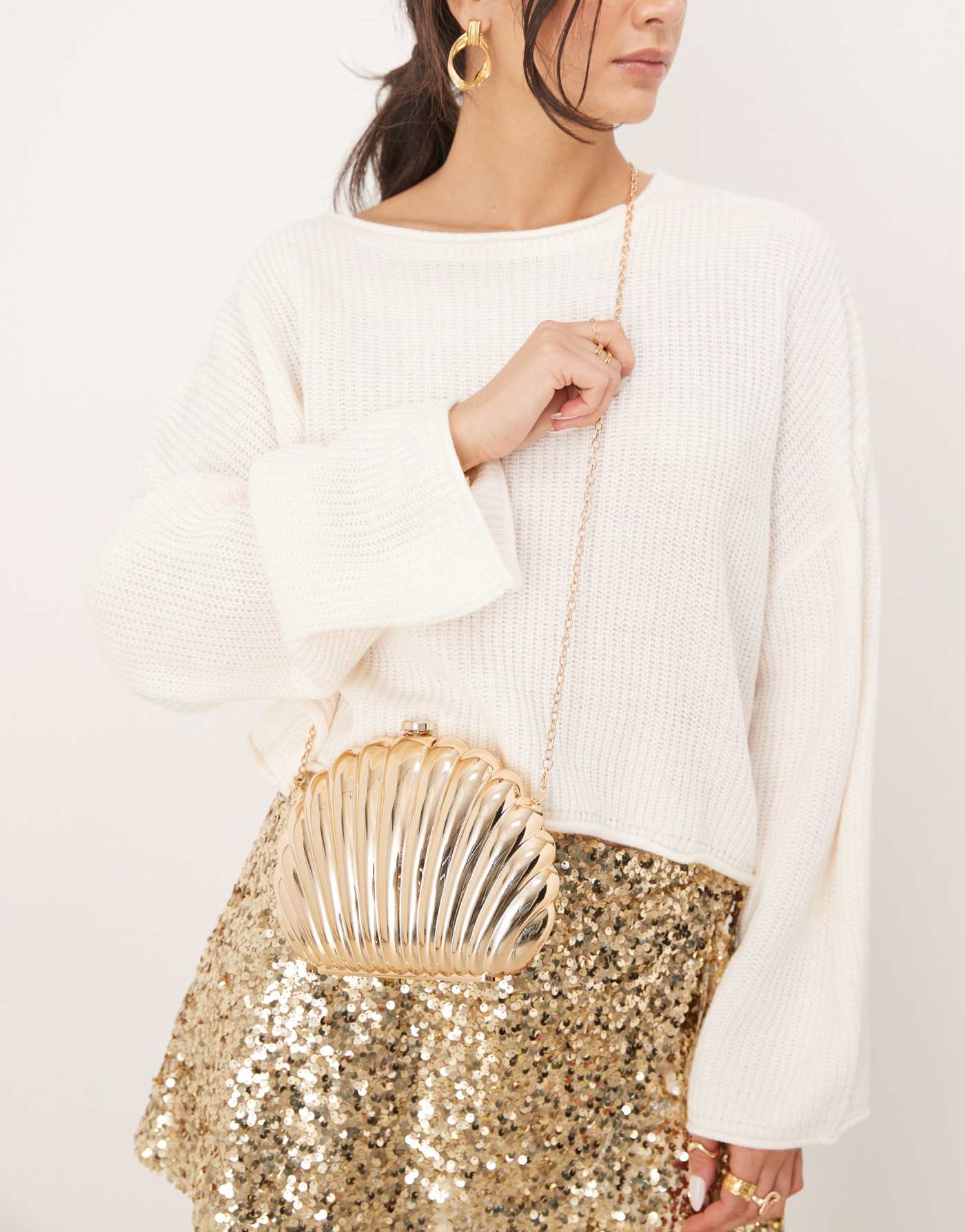 True Decadence shell clutch bag in gold