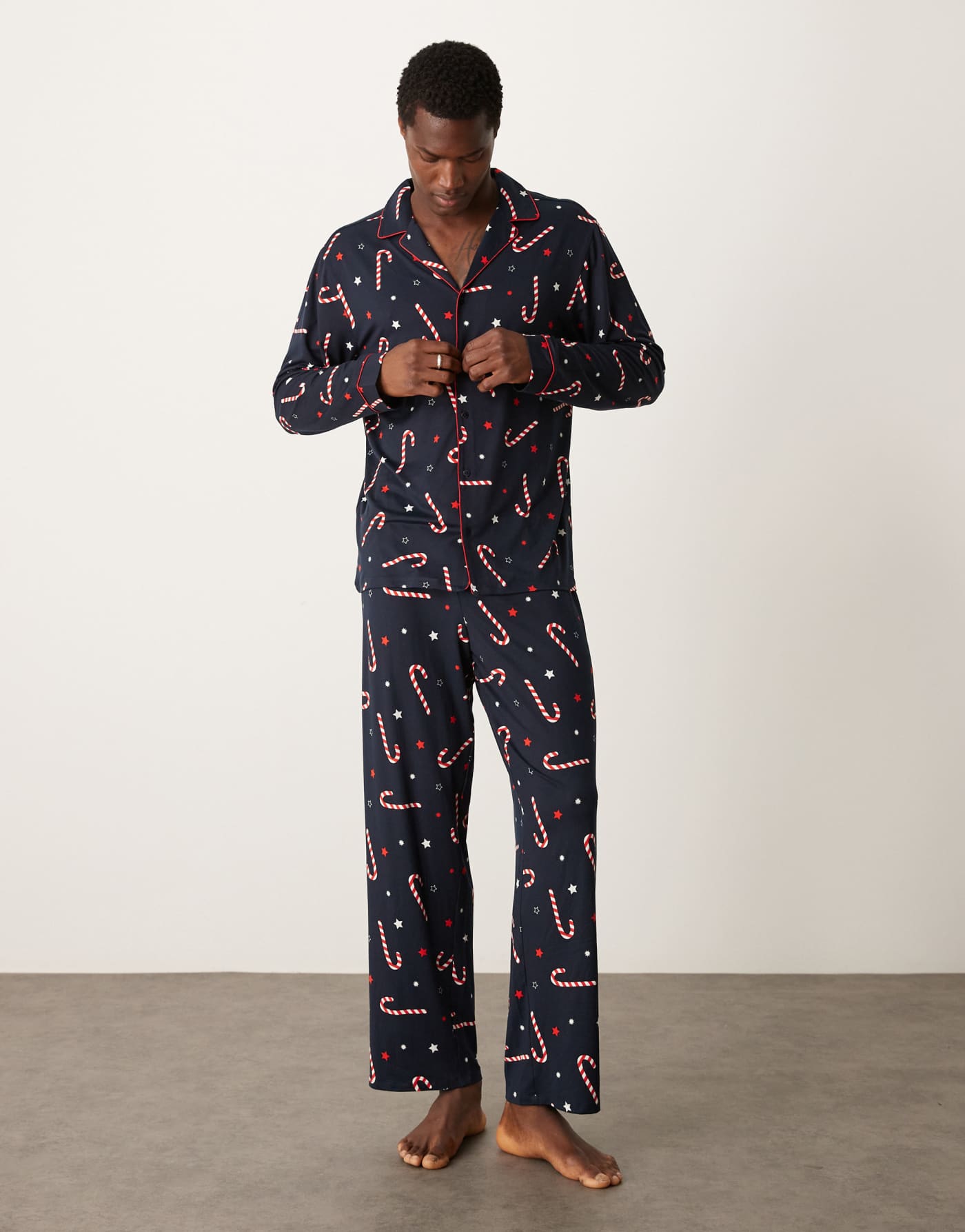 Urban Threads poly Christmas long sleeve shirt and trouser set in candy cane print