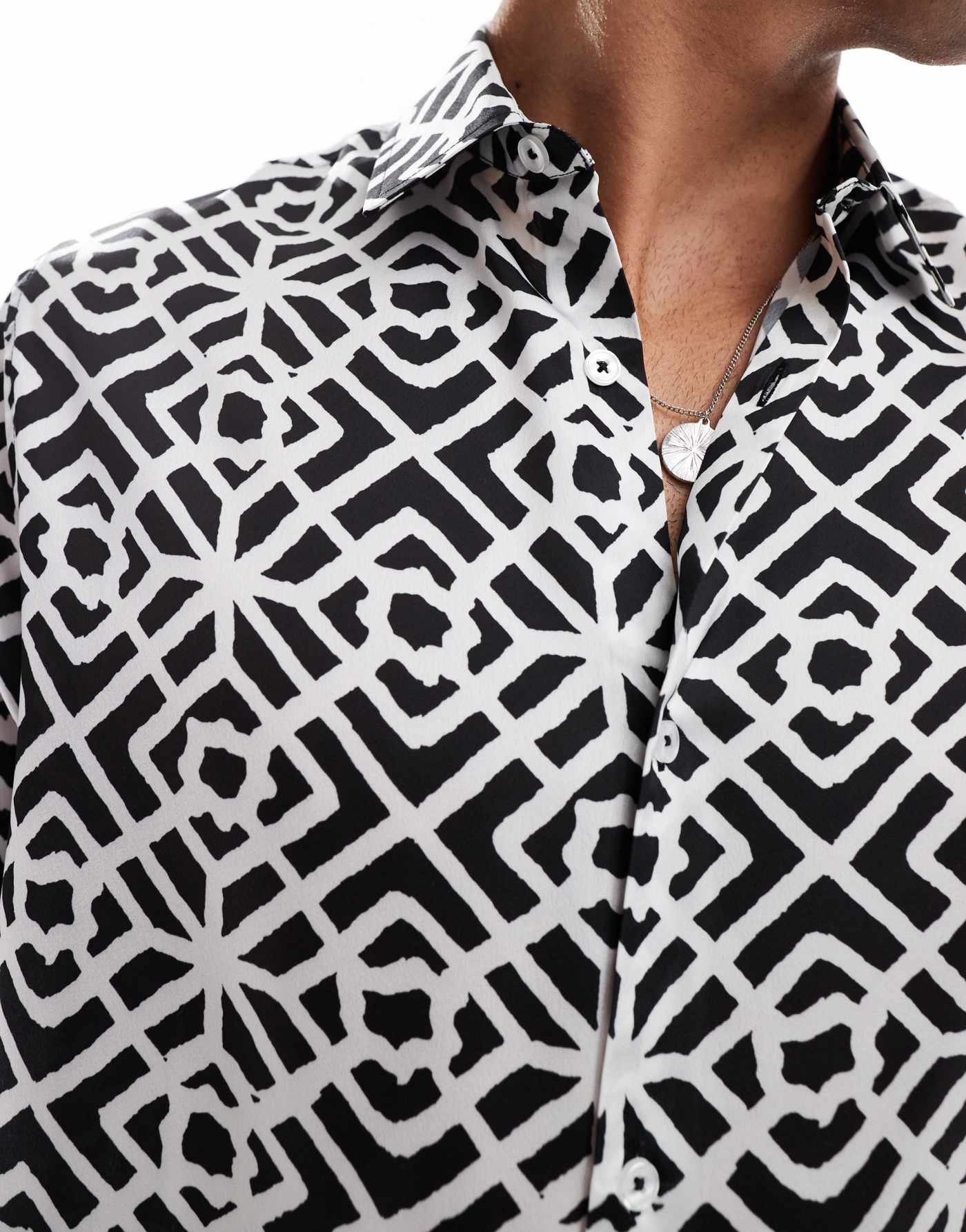 ASOS DESIGN boxy relaxed shirt with geo print in black and white