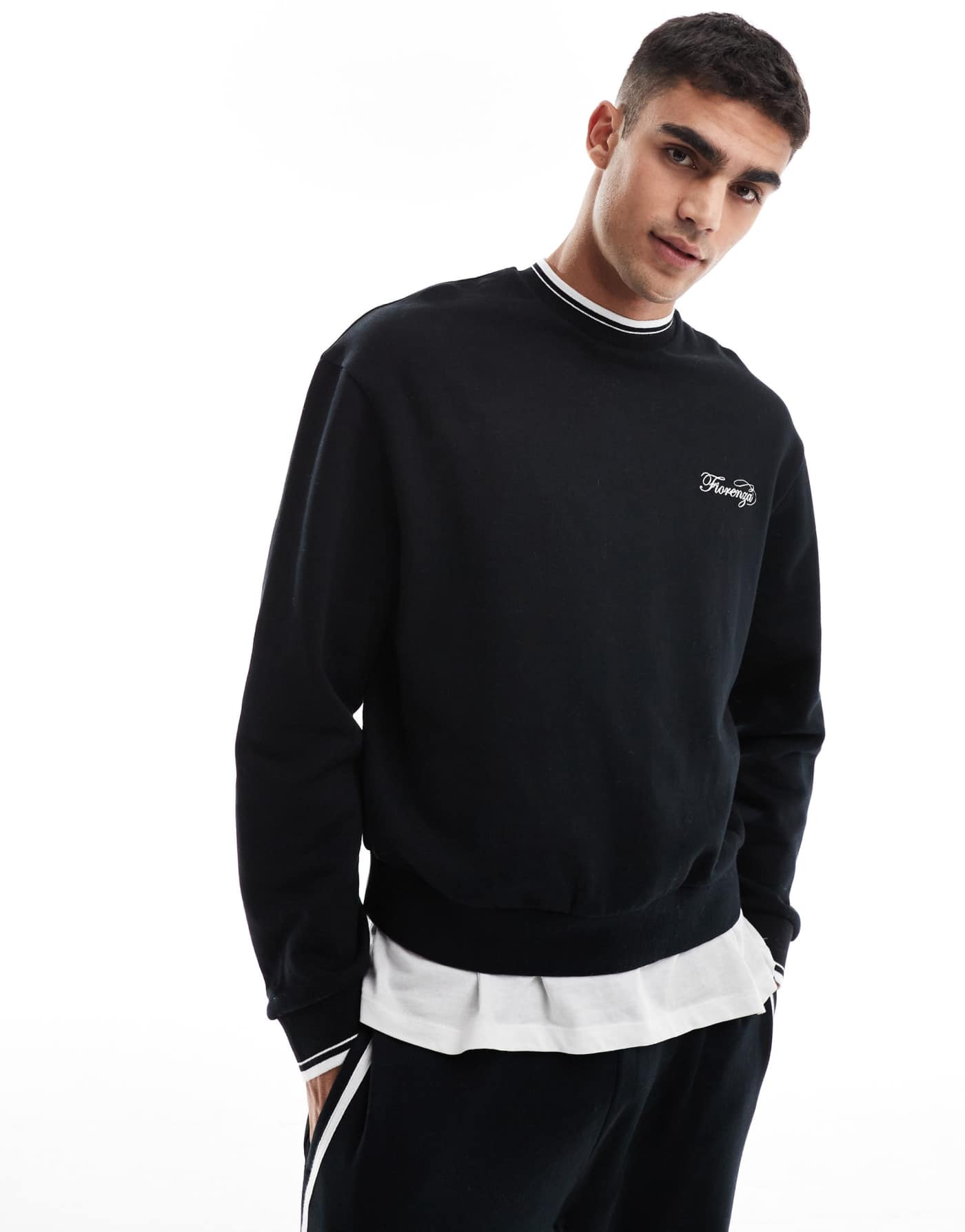 ASOS DESIGN oversized sweatshirt with chest embroidery and tipping in black