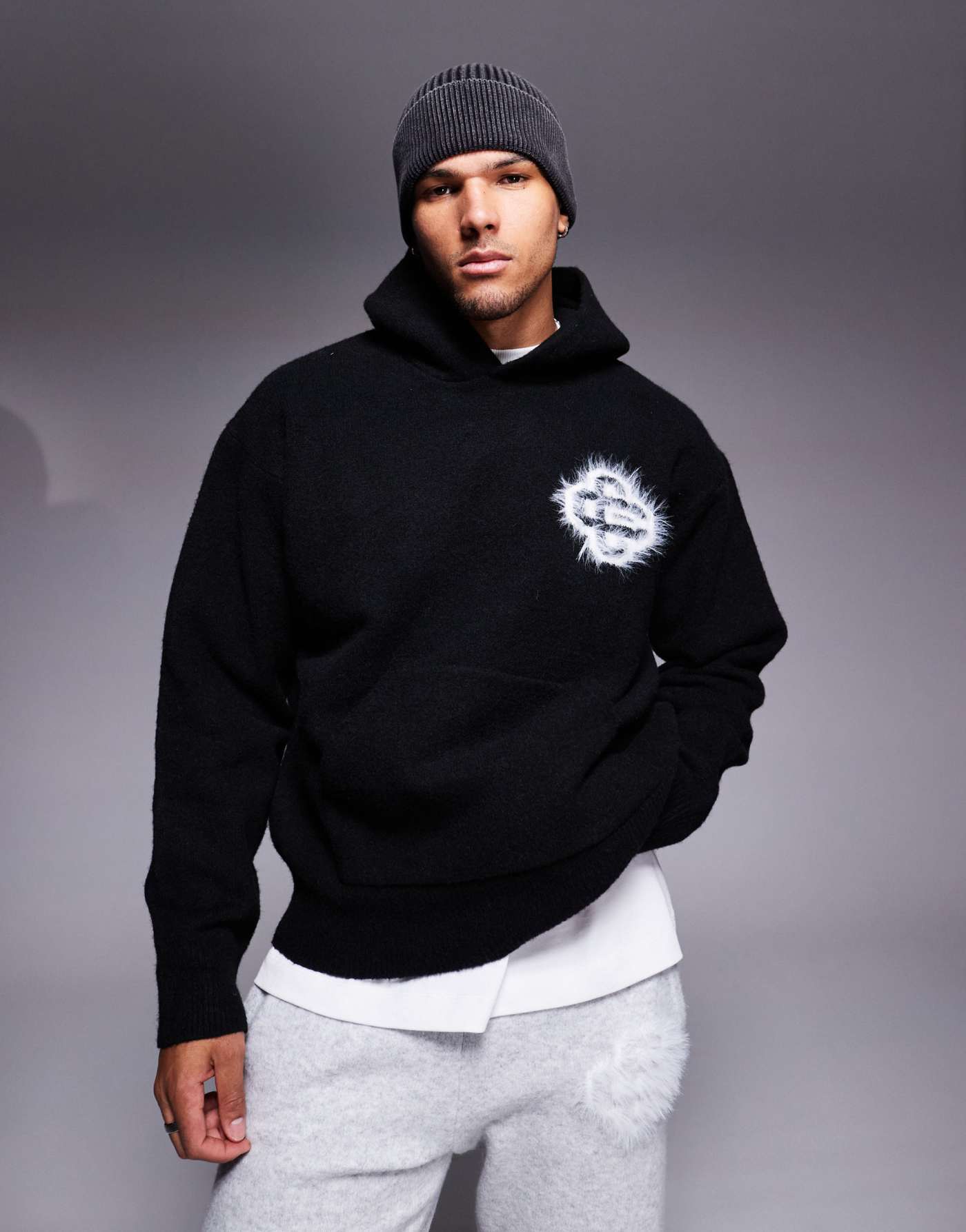 The Couture Club fluffy knit emblem hoodie in black