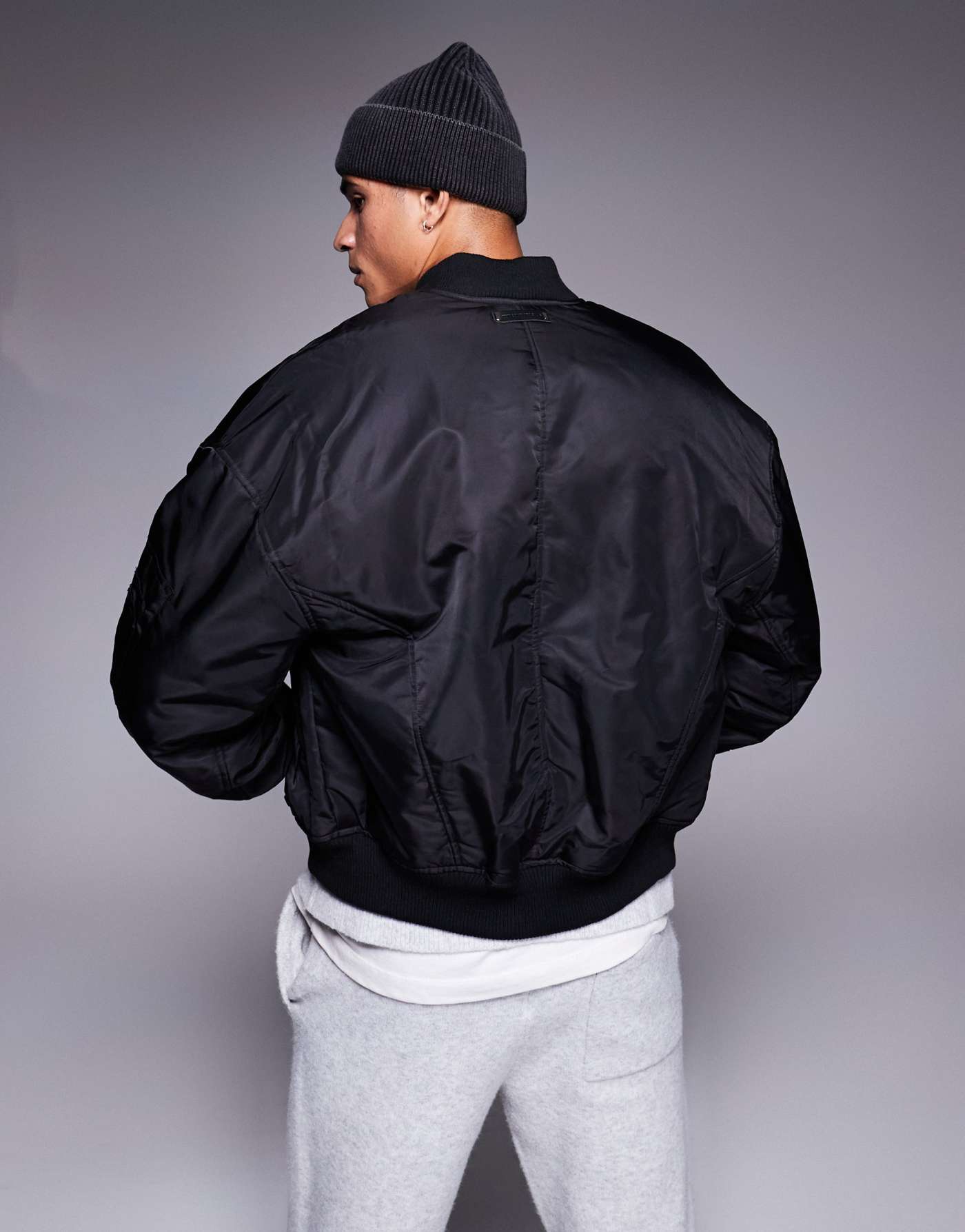 The Couture Club oversized emblem bomber jacket in black