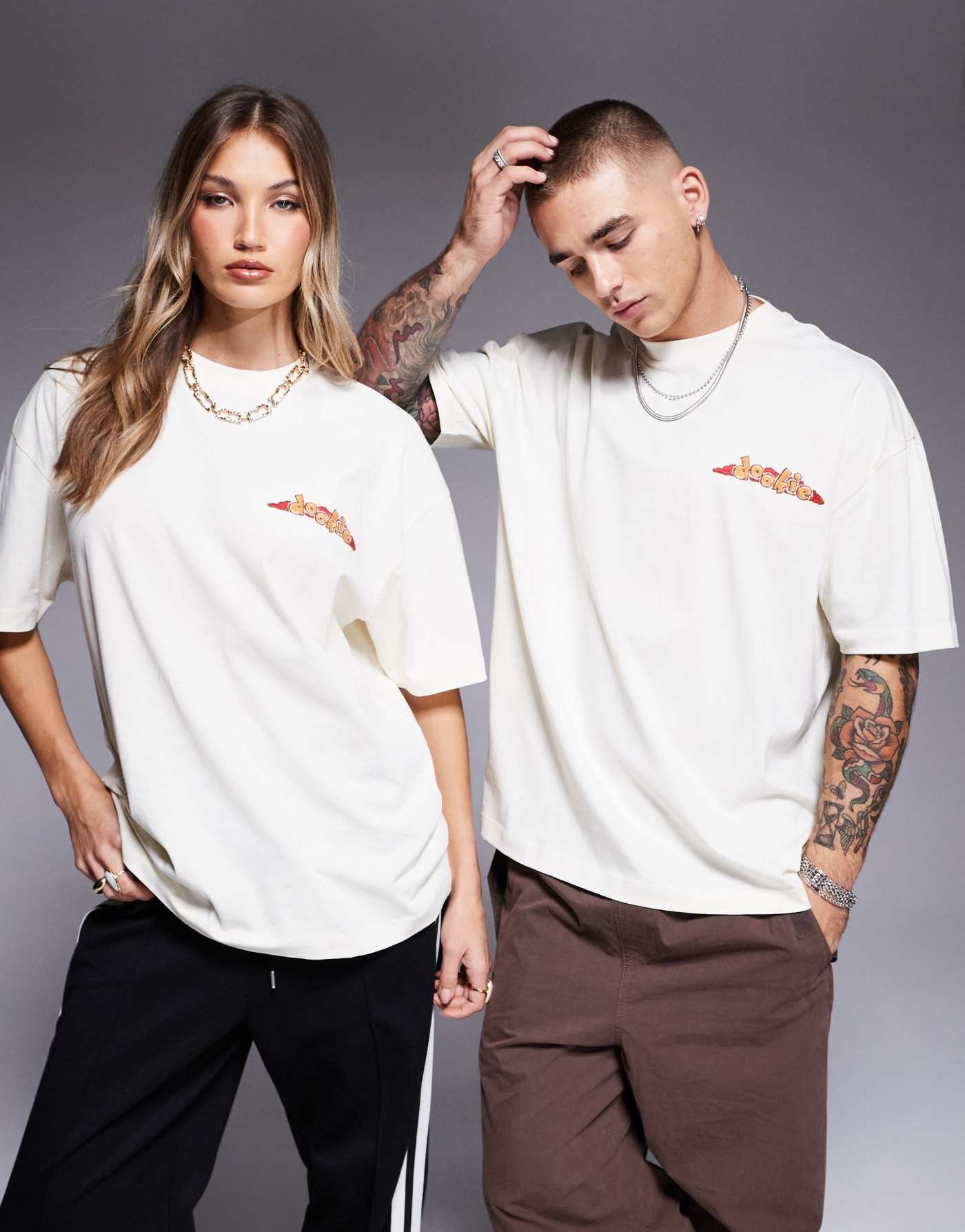 ASOS DESIGN unisex oversized license t-shirt with Green Day Dookie prints in off white