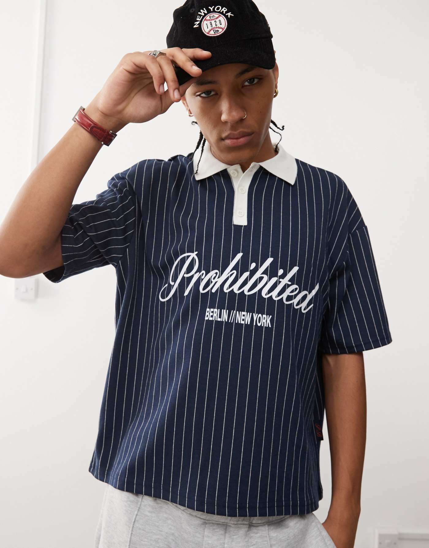 Prohibited collar logo detail football inspired shirt in navy stripe