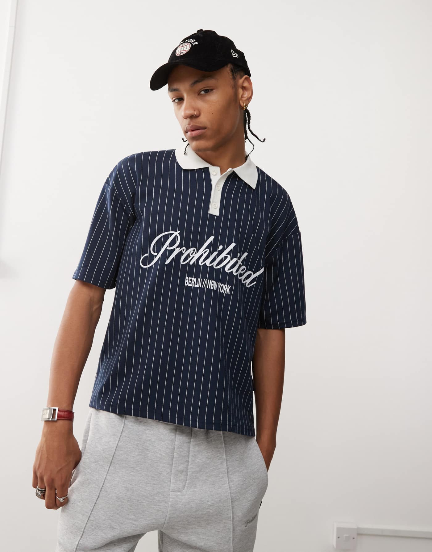 Prohibited collar logo detail football inspired shirt in navy stripe