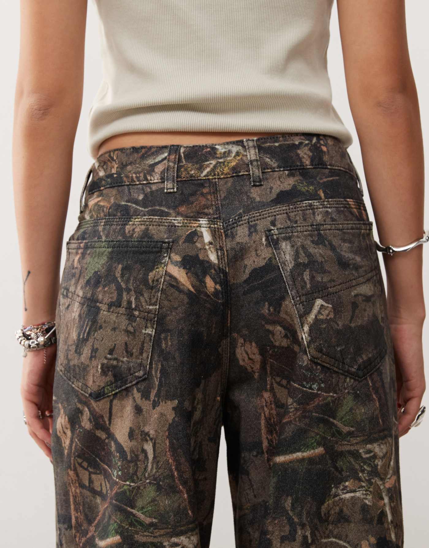 COLLUSION x002 baggy jeans in tree camo print