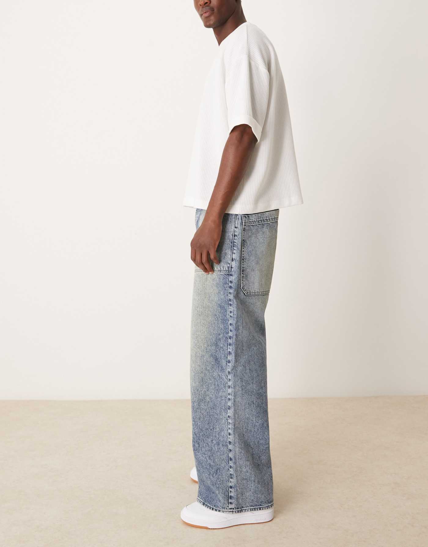 ASOS DESIGN super baggy jeans with oversized back pockets in dirty blue tint