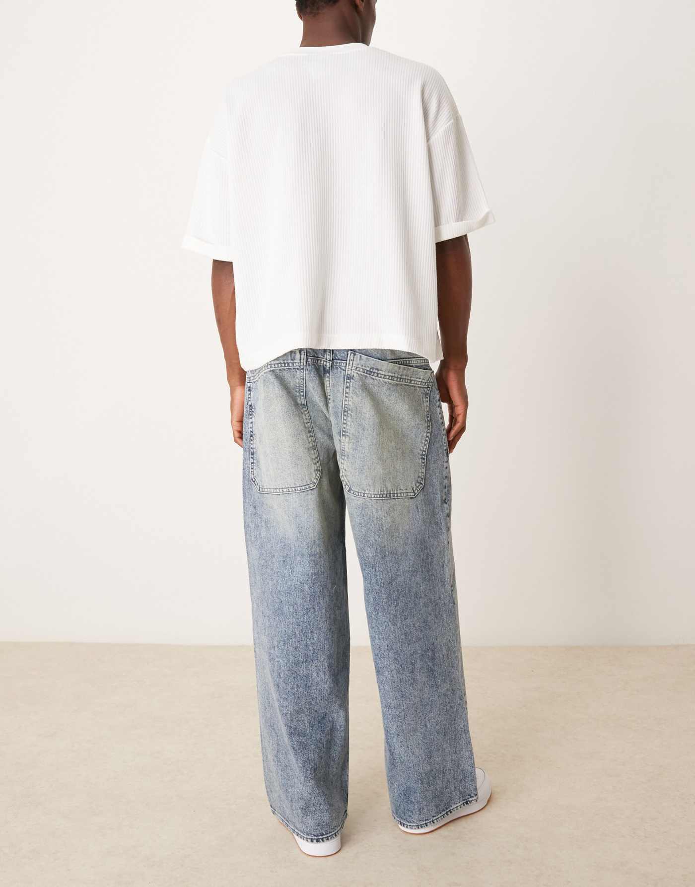 ASOS DESIGN super baggy jeans with oversized back pockets in dirty blue tint