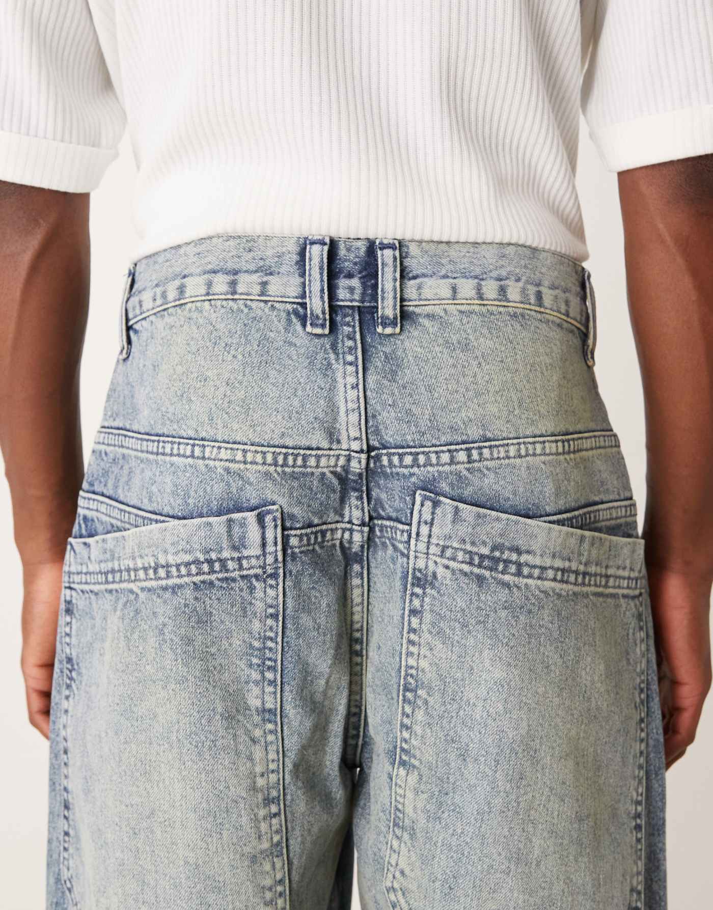 ASOS DESIGN super baggy jeans with oversized back pockets in dirty blue tint