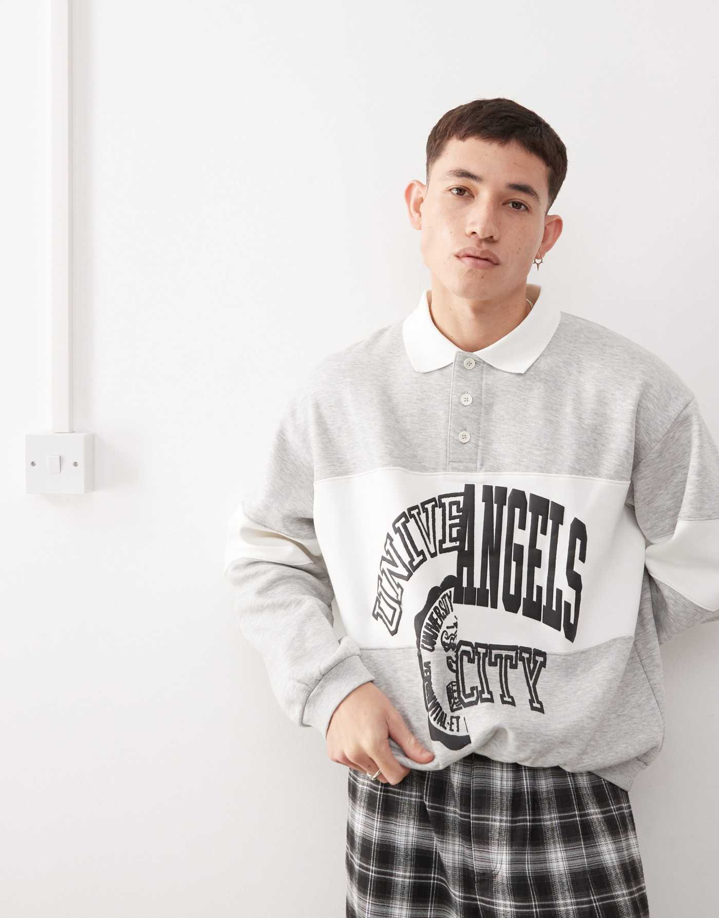 Weekday Andre oversized polo sweatshirt with cut and sew varsity graphic in grey melange