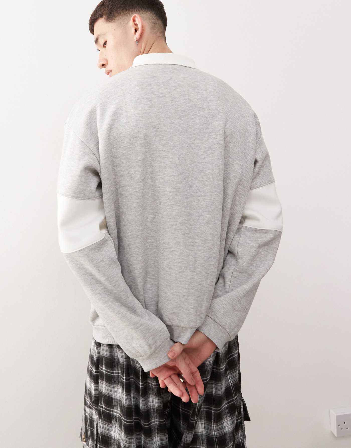 Weekday Andre oversized polo sweatshirt with cut and sew varsity graphic in grey melange