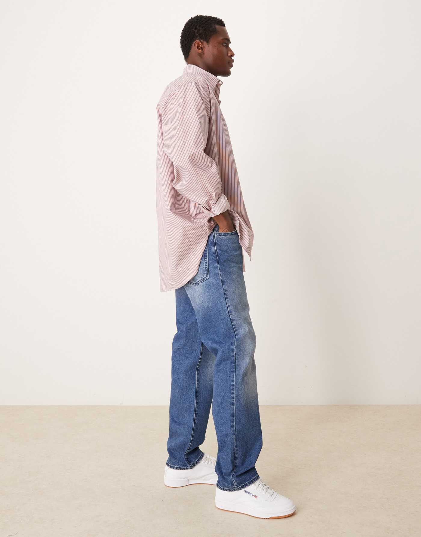 ASOS DESIGN straight fit jeans with gunge wash