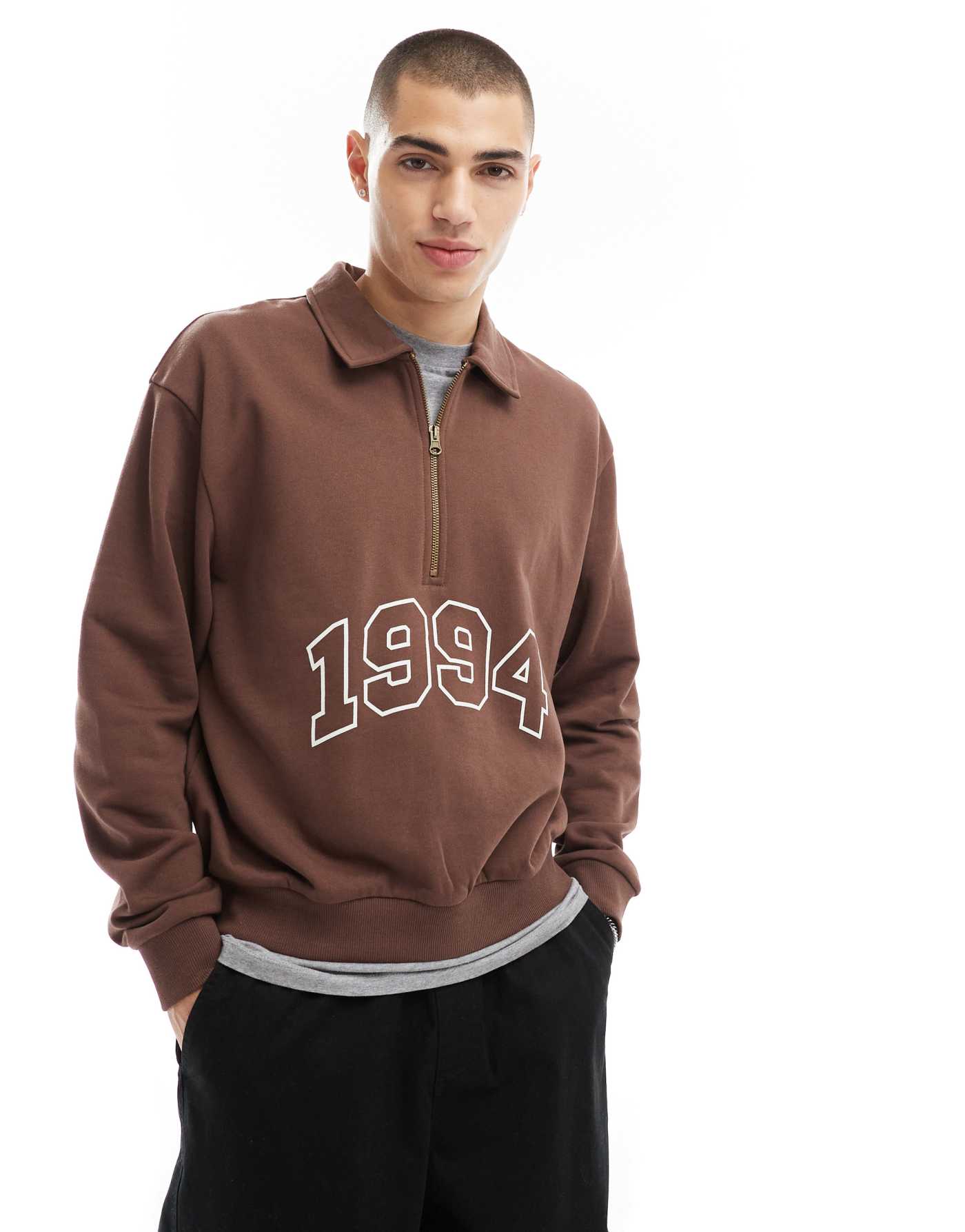 ASOS DESIGN boxy oversized polo sweatshirt with print and tipping detail in brown