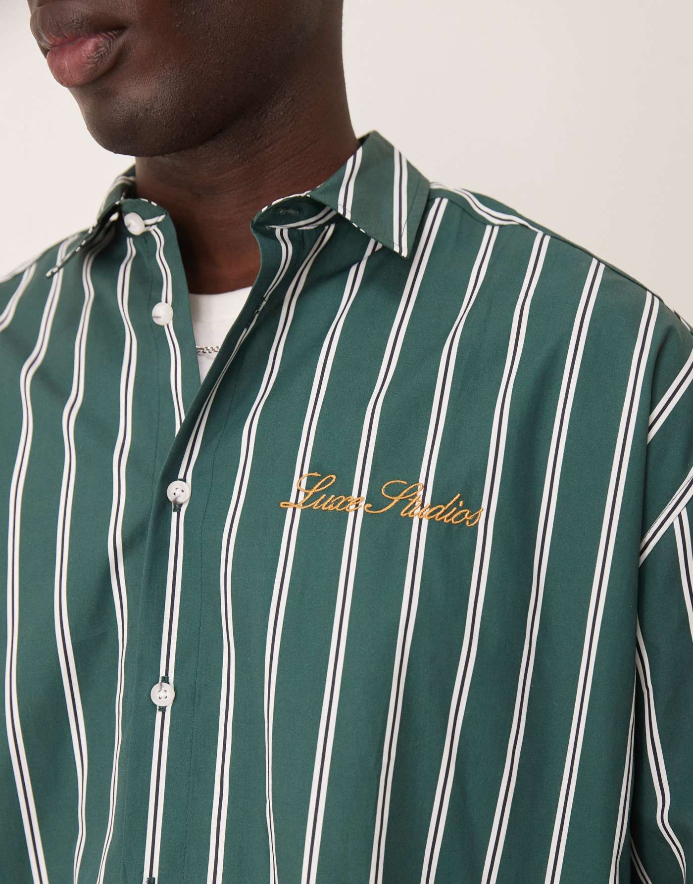 ASOS DESIGN oversized boxy shirt with embroidery in green and white stripe