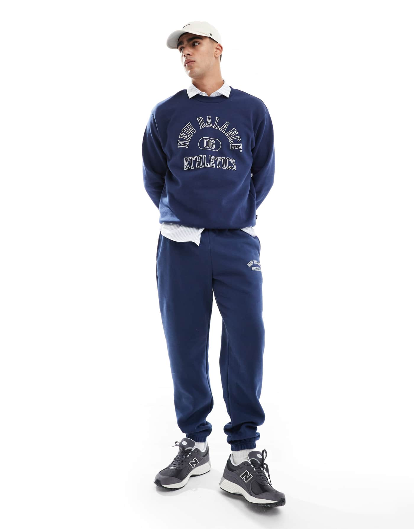 New Balance Sport essentials fleece graphic jogger set in navy