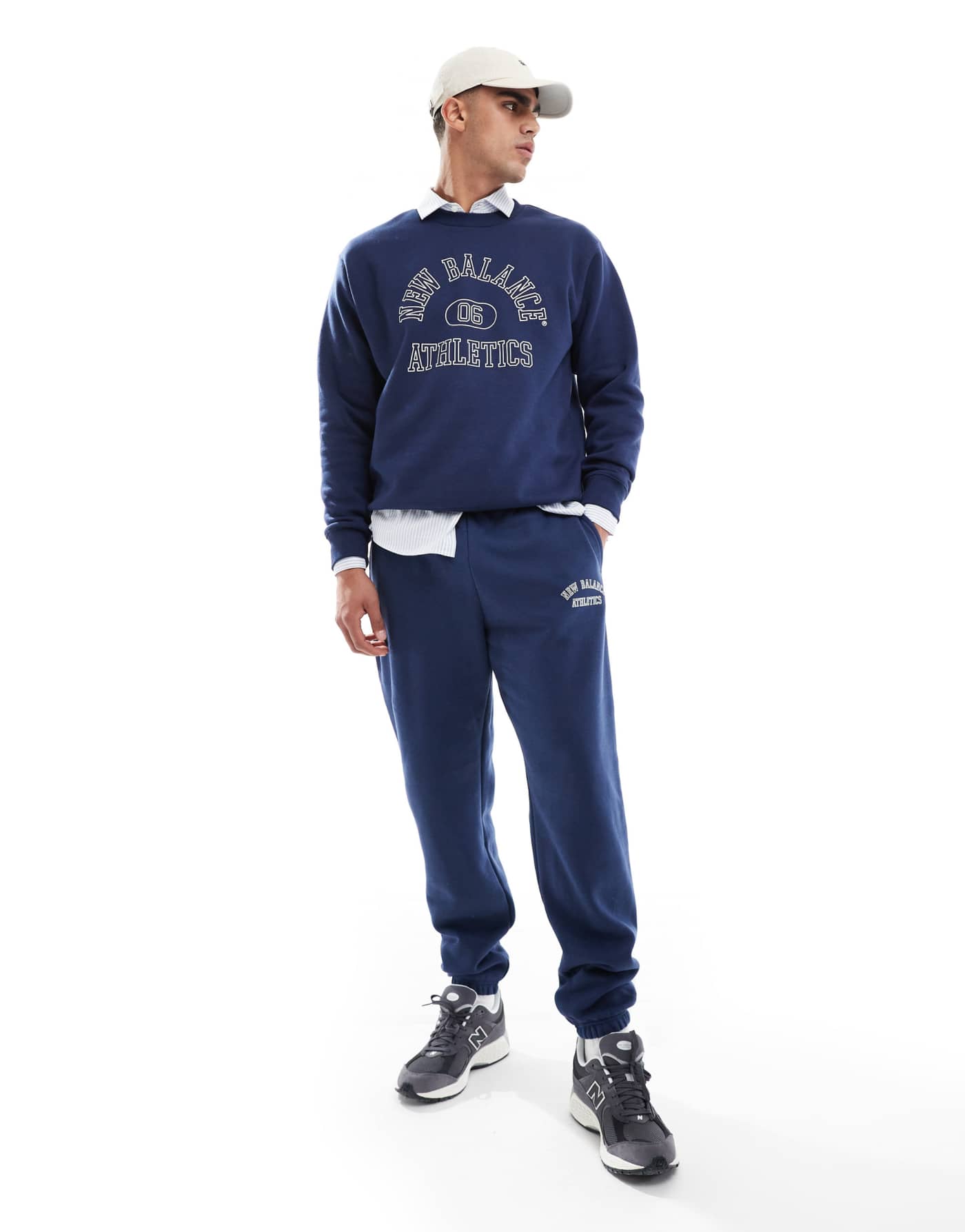 New Balance Sport essentials fleece graphic jogger set in navy