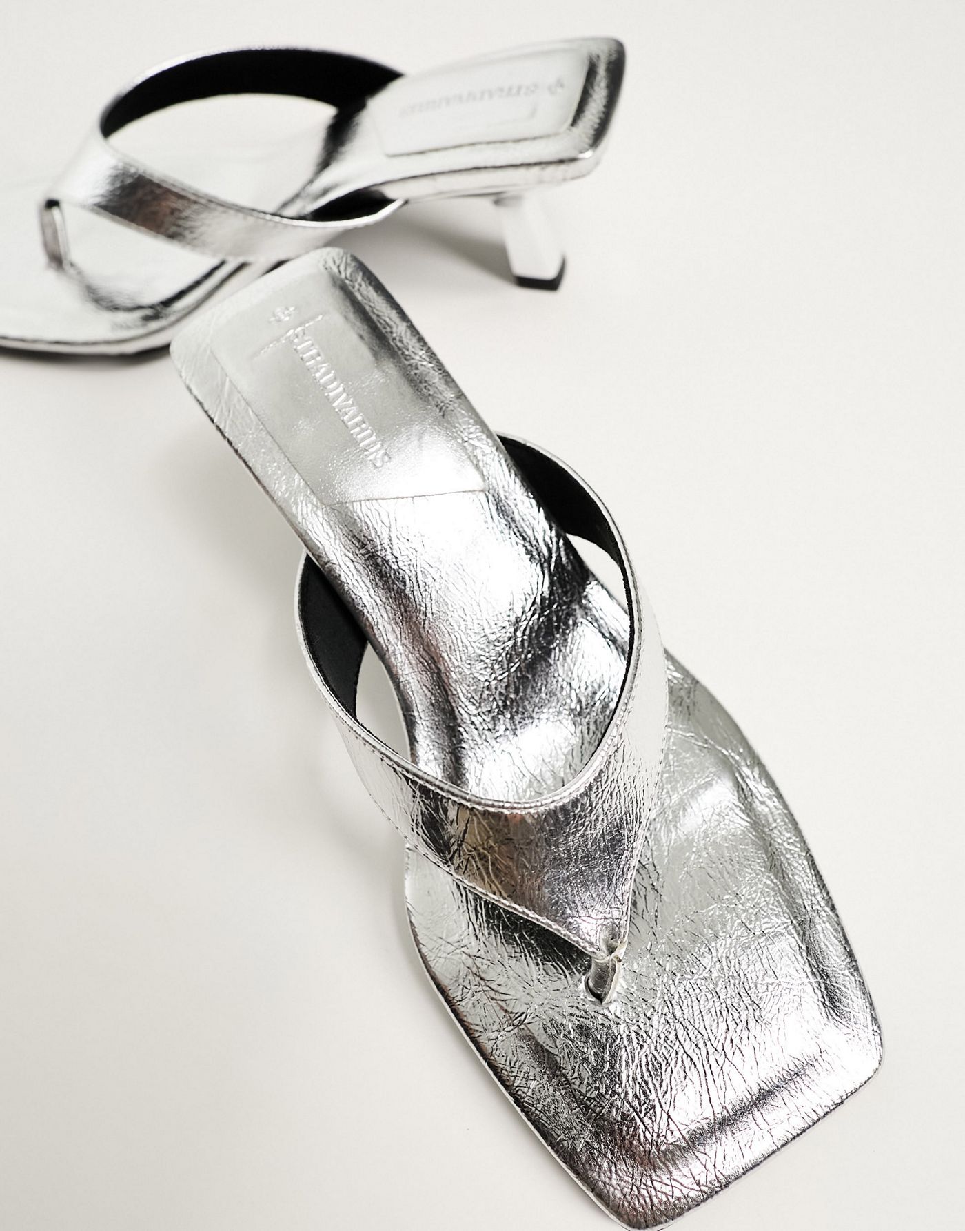 Stradivarius heeled mule in silver 