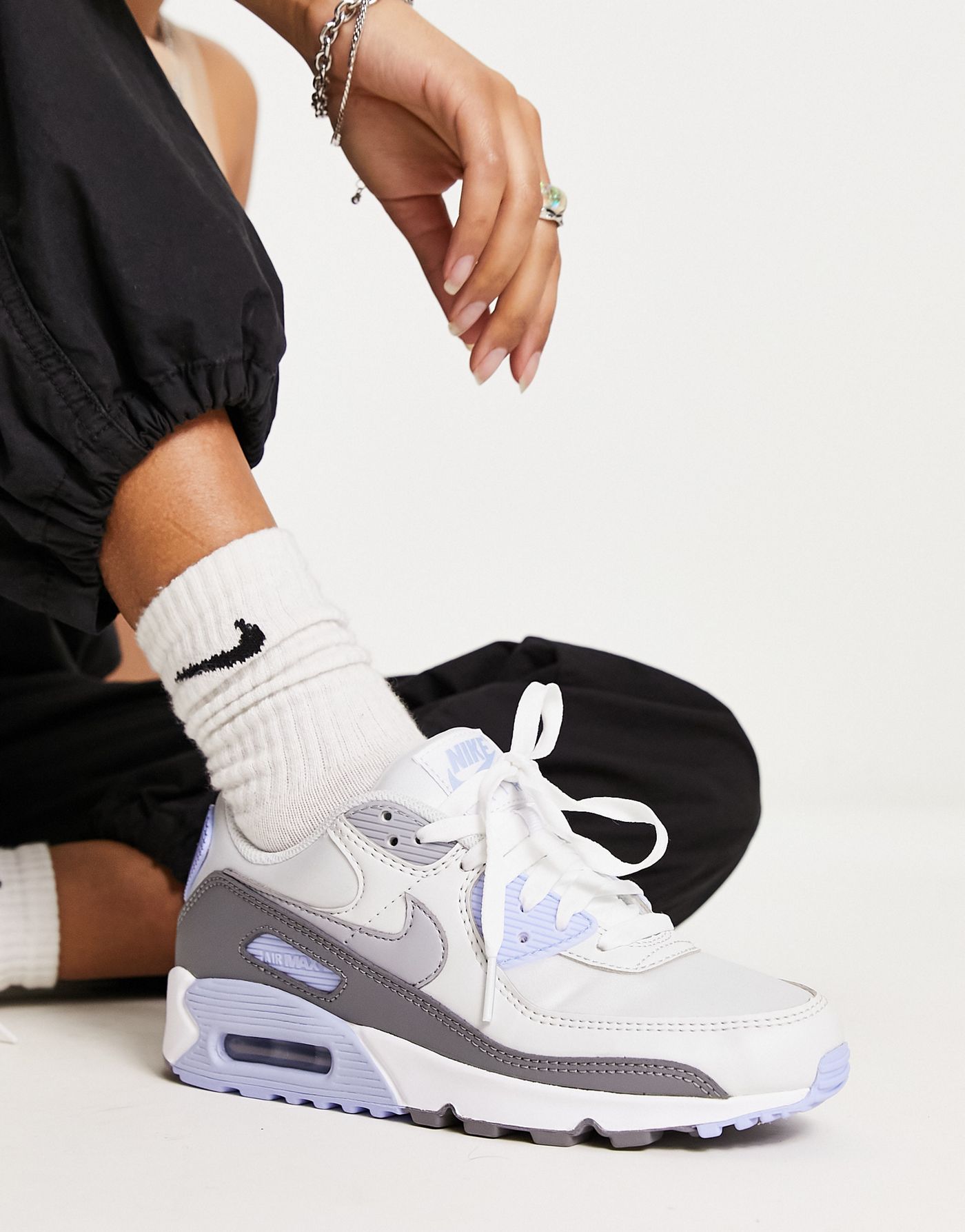 Nike Air Max 90 trainers in white and wolf grey