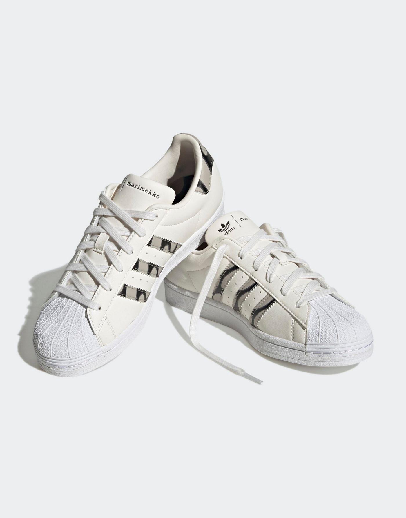 adidas Originals Superstar trainers in white and black