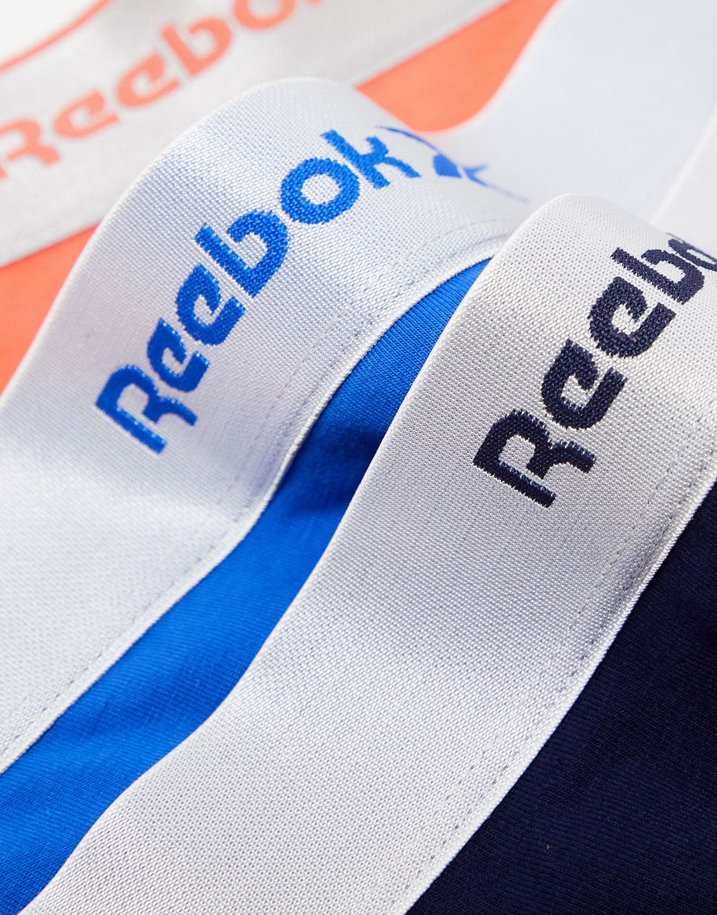 Reebok lacy 3 pack briefs with shine banding in blue navy and orange