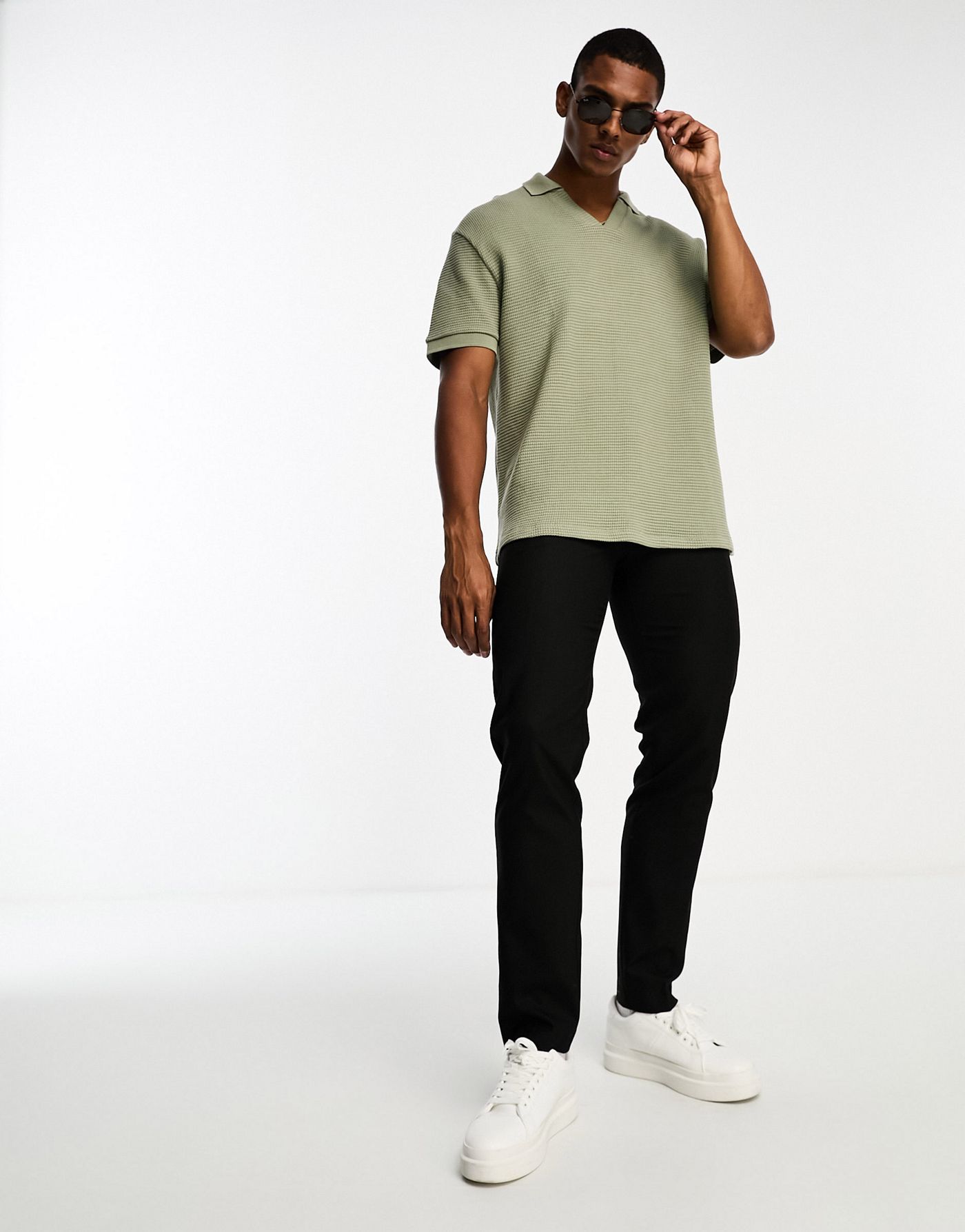 ASOS DESIGN relaxed fit waffle polo in khaki