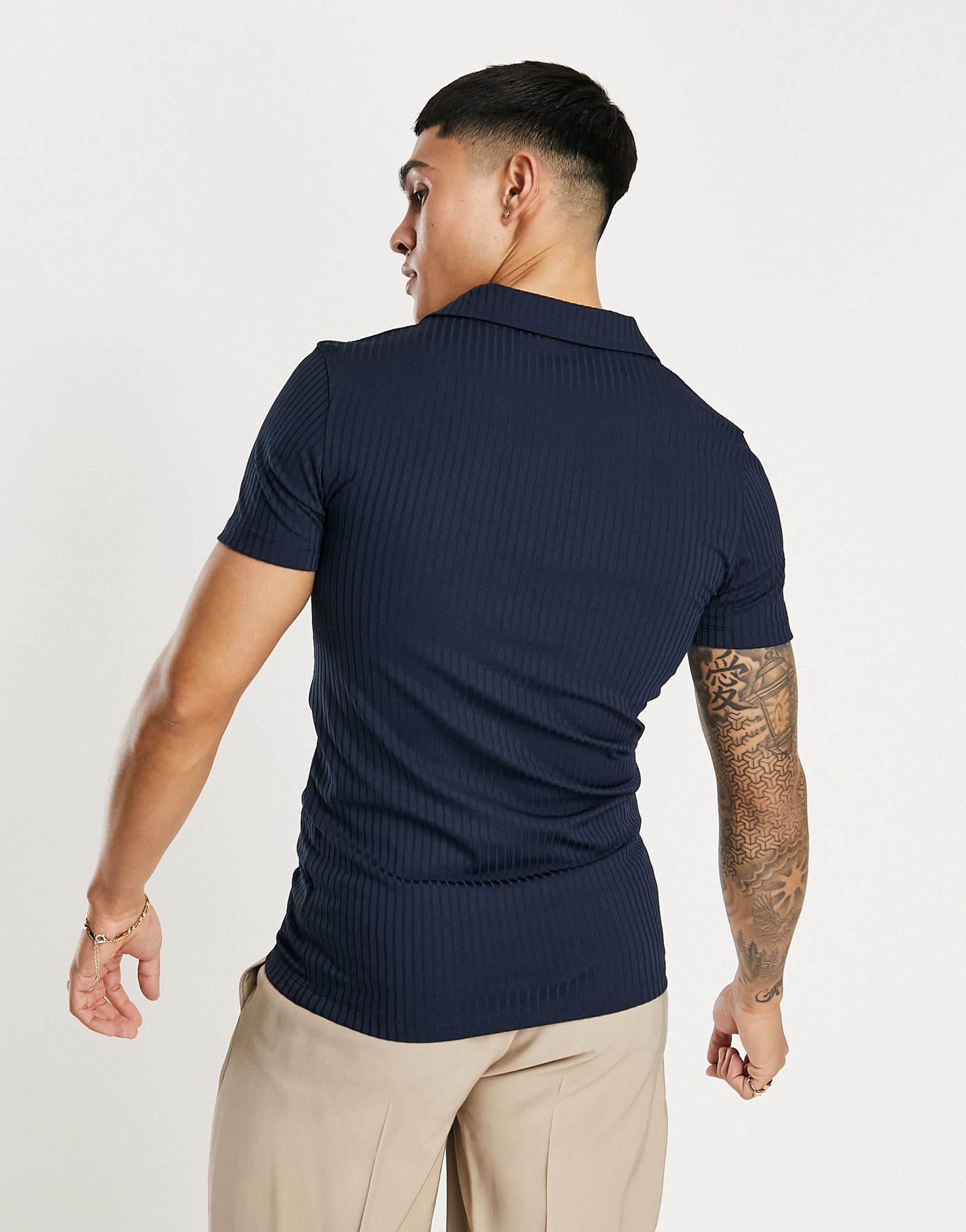 ASOS DESIGN muscle fit ribbed revere polo in navy