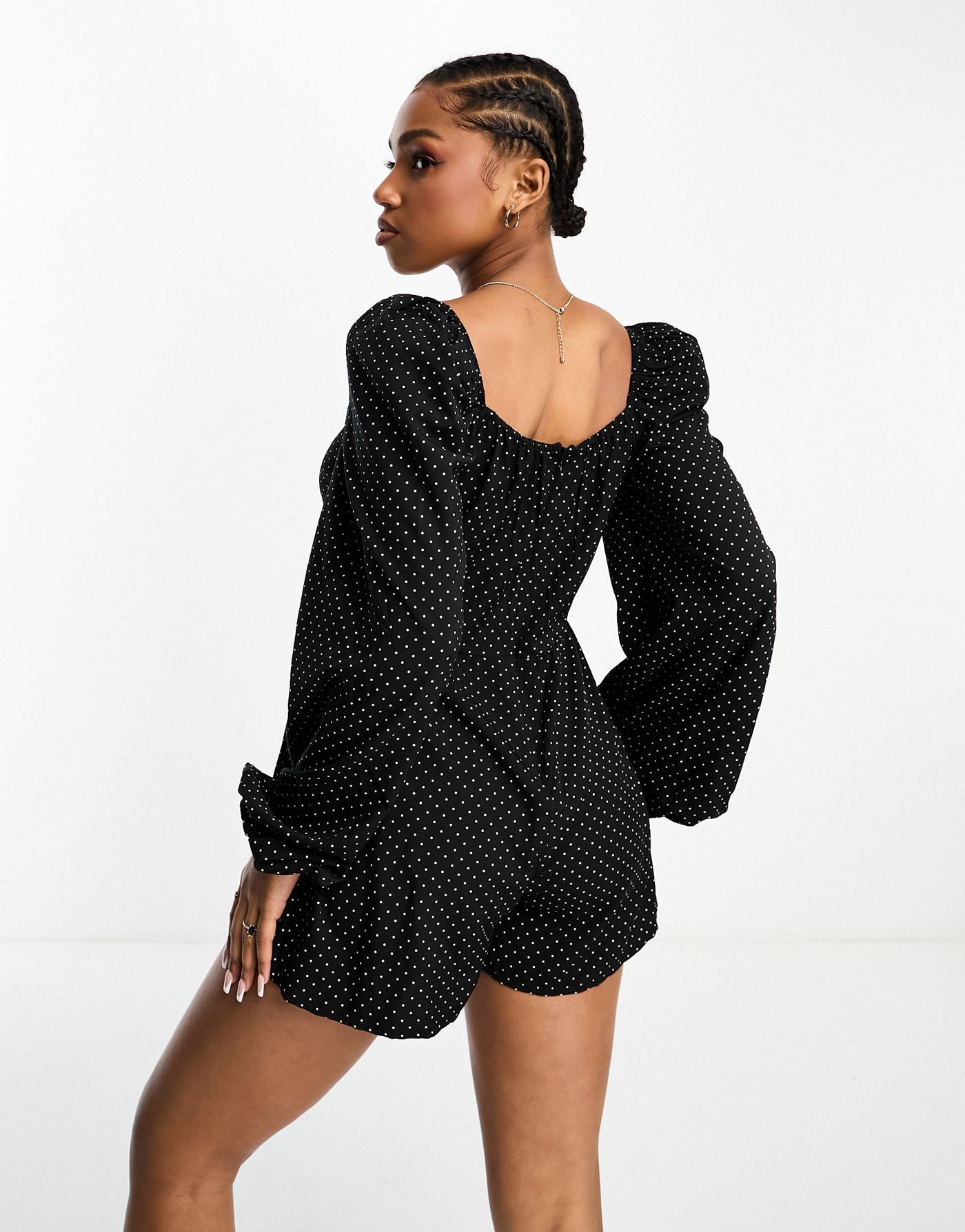 In The Style volume sleeve playsuit in black spot print