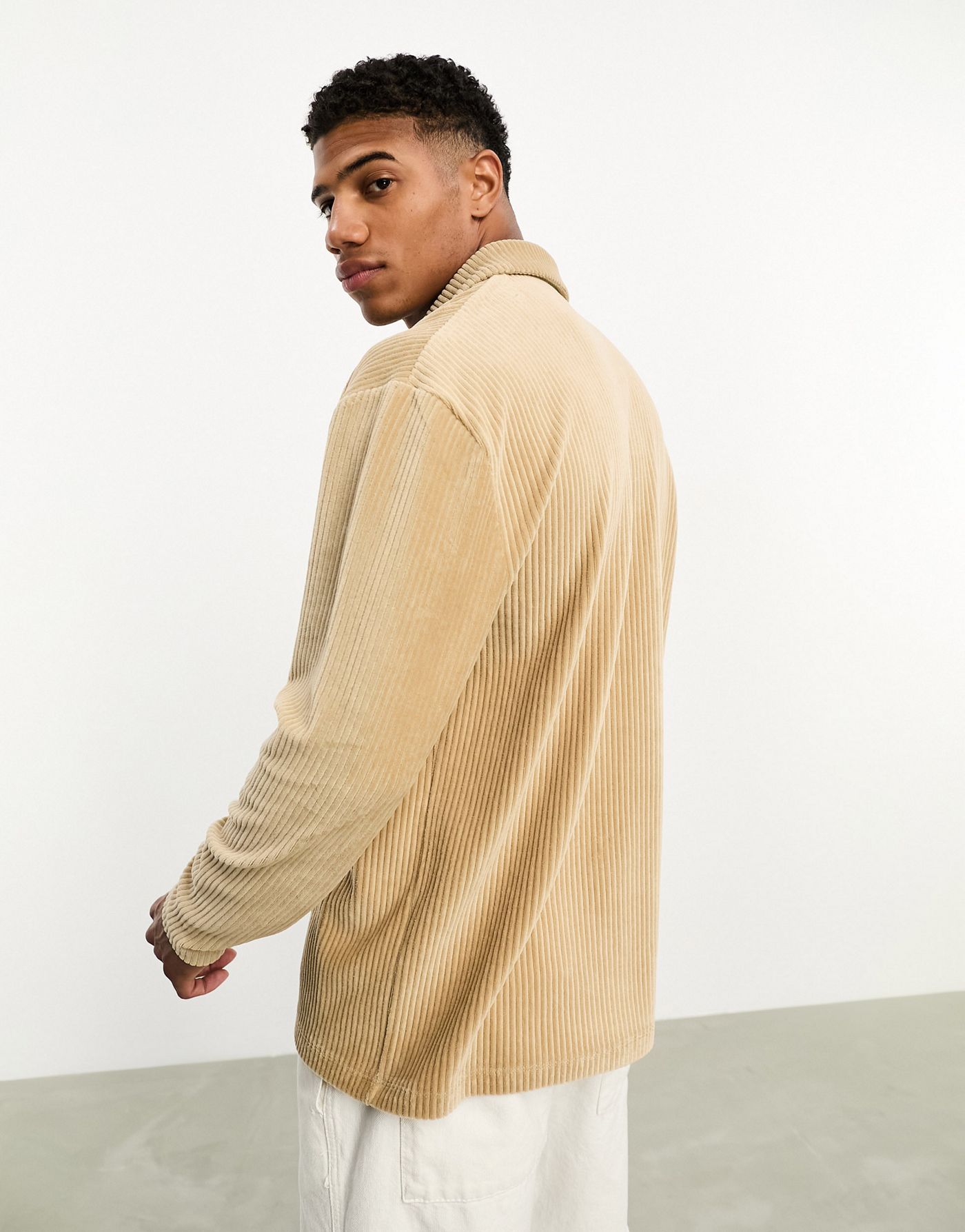 ASOS DESIGN relaxed long sleeve polo with revere collar in beige ribbed velour