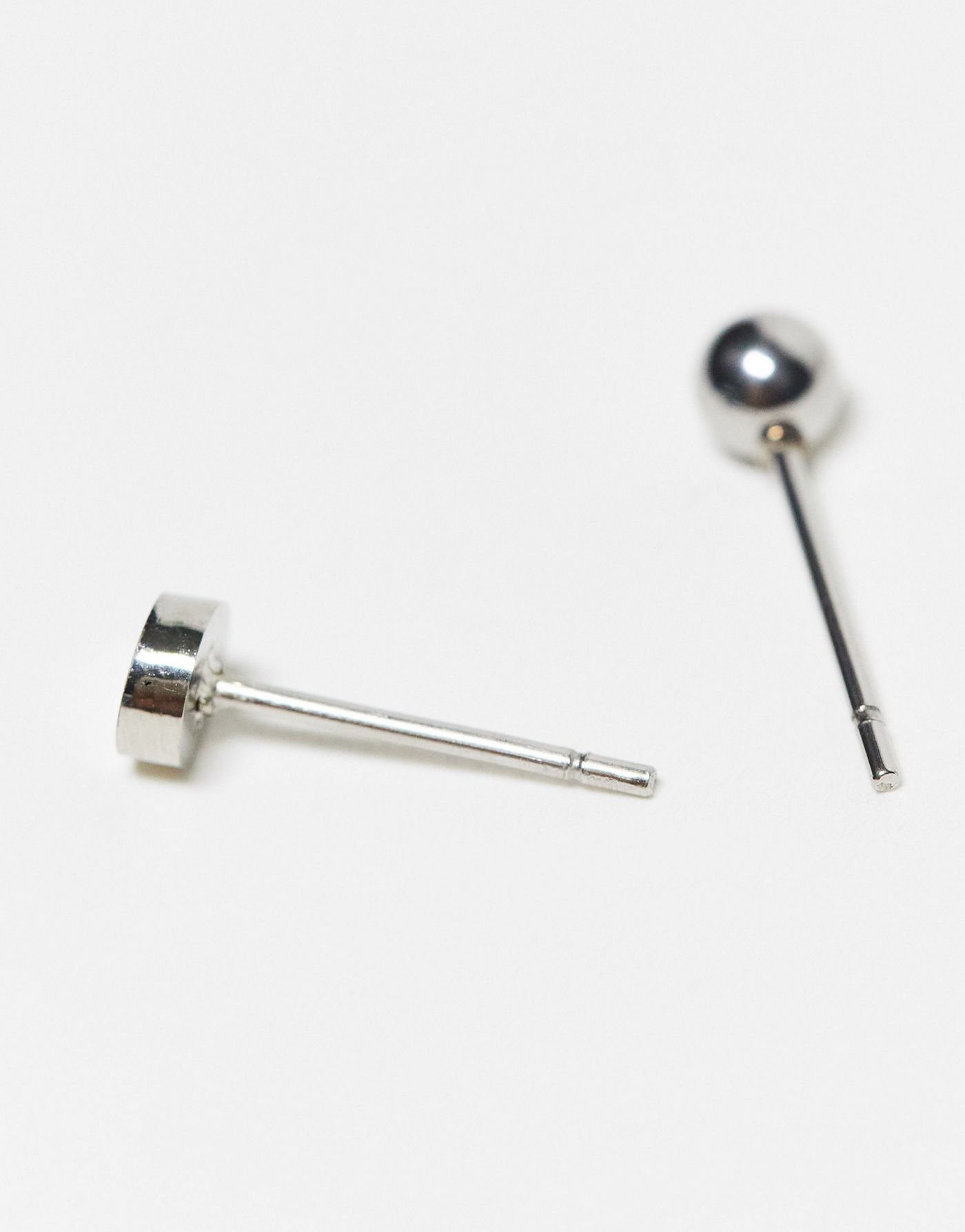 ASOS DESIGN 6 pack waterproof stainless steel stud earrings set in silver gold and matte black