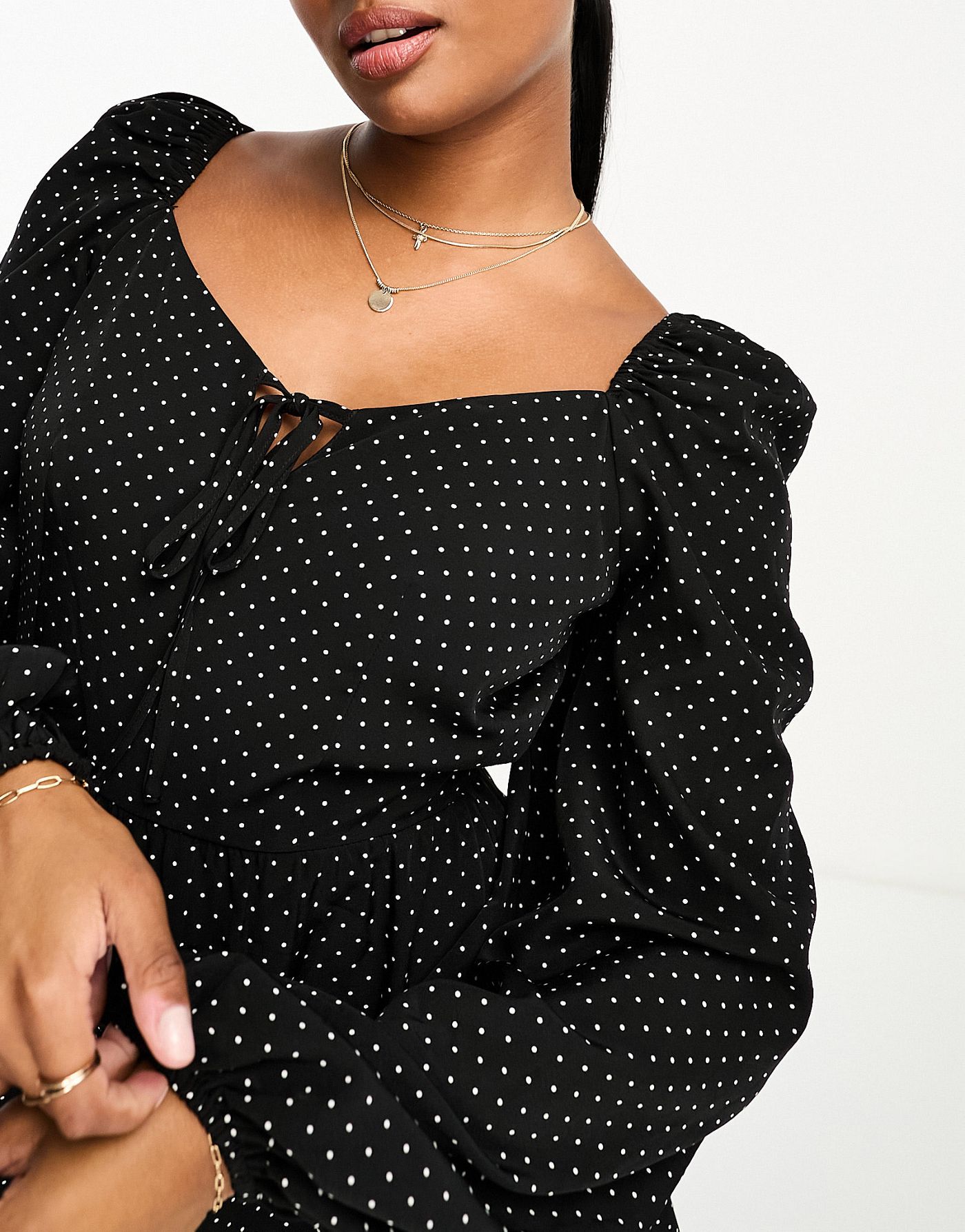 In The Style Petite volume sleeve playsuit in black spot print