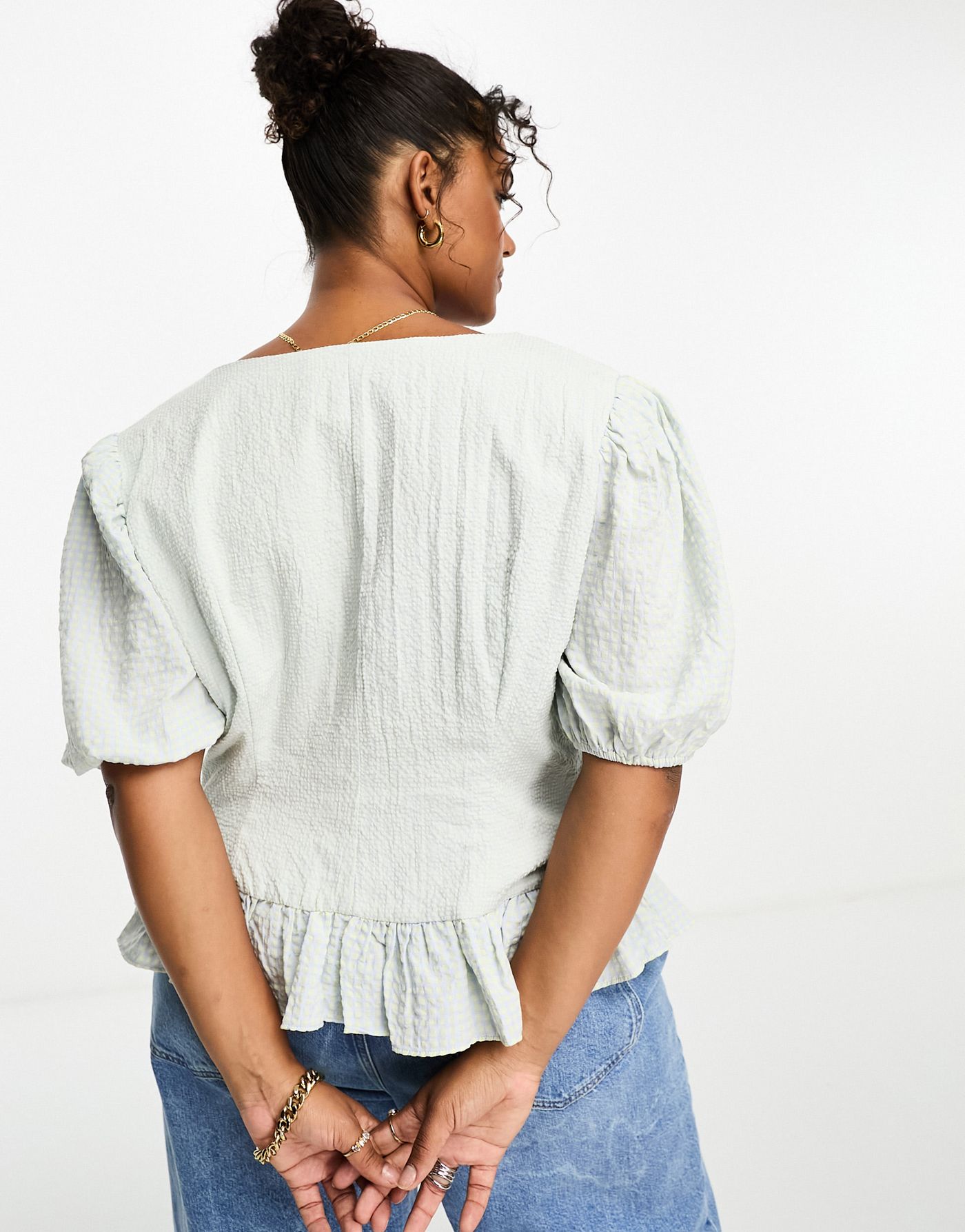 The Frolic Plus  v-neck button front puff sleeve blouse in blue gingham