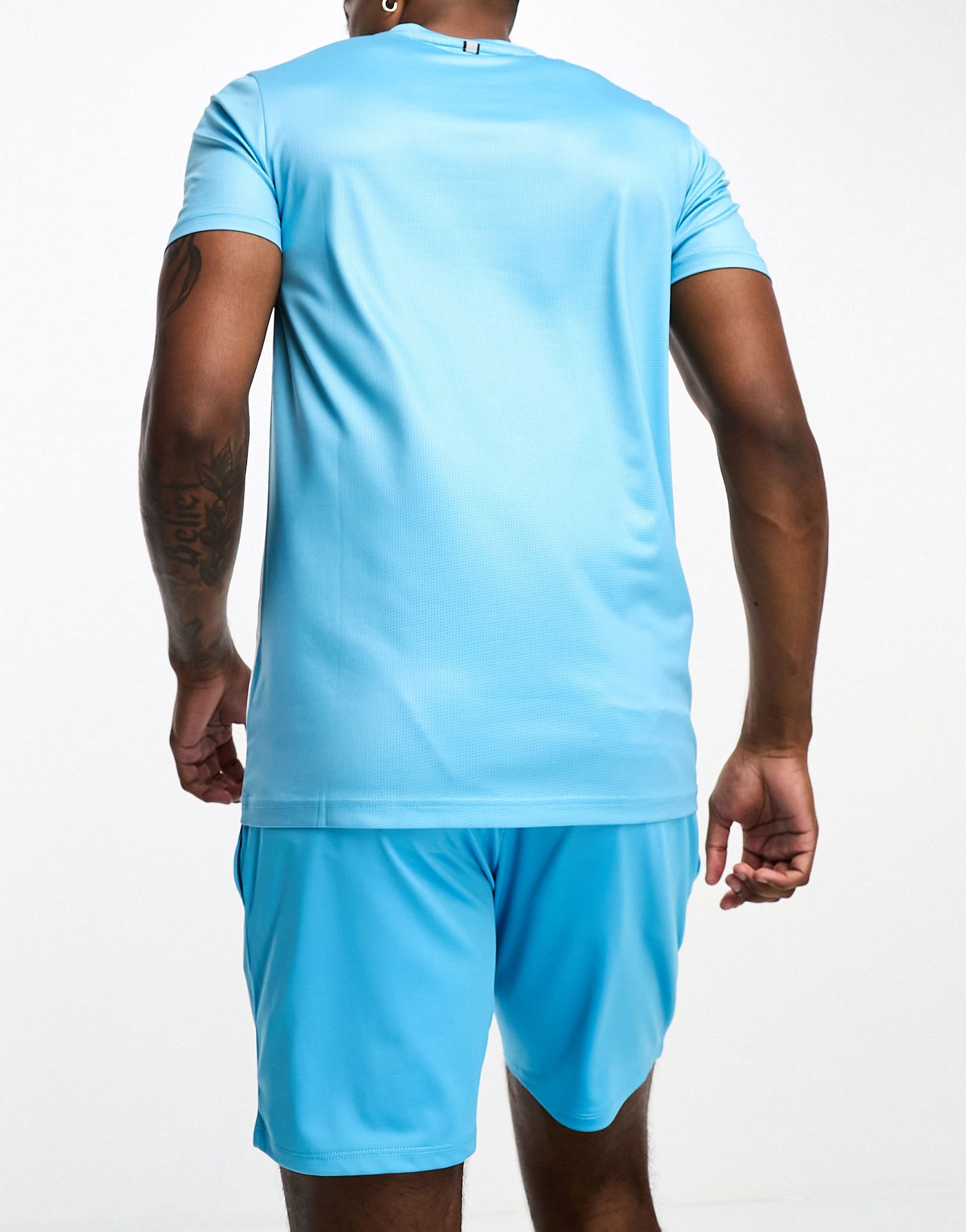 Threadbare Fitness tennis t-shirt & short set in white & turquoise