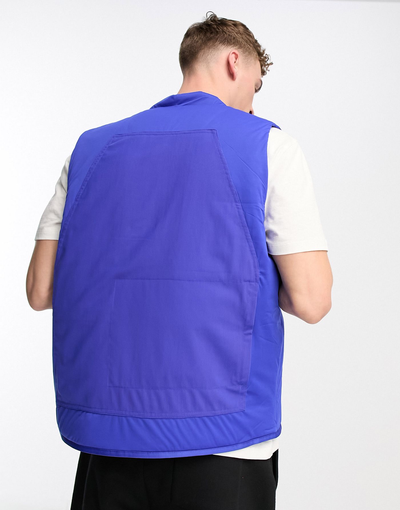 adidas Sportswear Future Lounge rubber logo puffer vest in blue