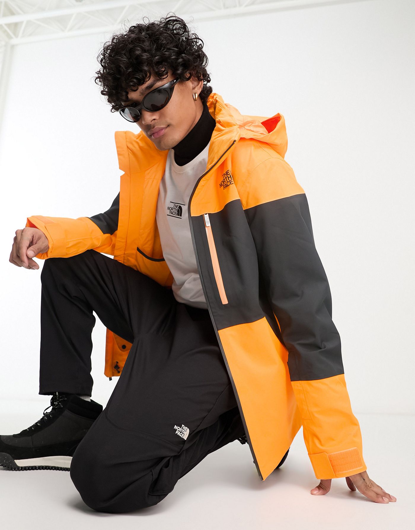 The North Face Ski Chakal insulated DryVent waterproof ski jacket in black and orange