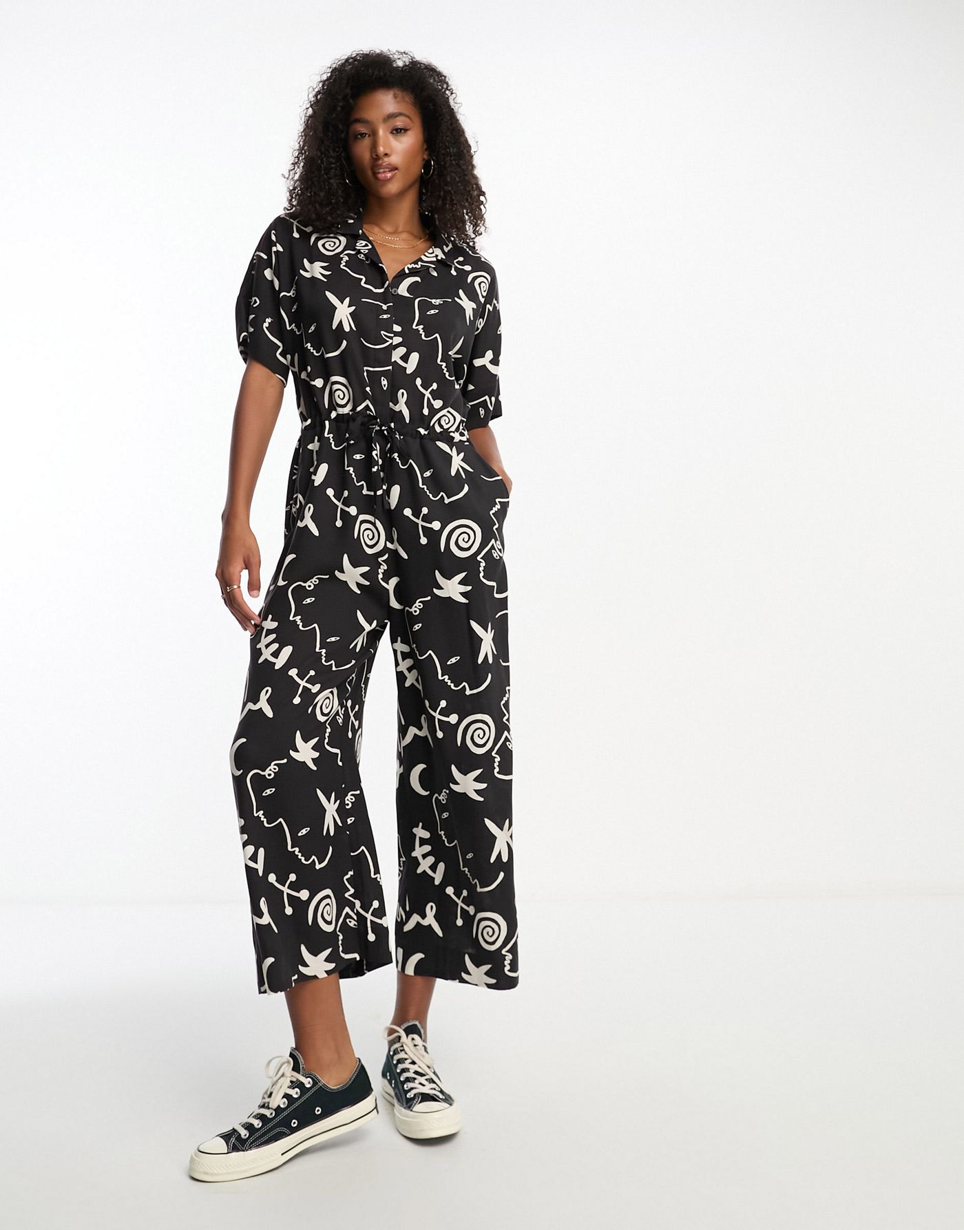 Monki tie waist jumpsuit in black and white face and moon print